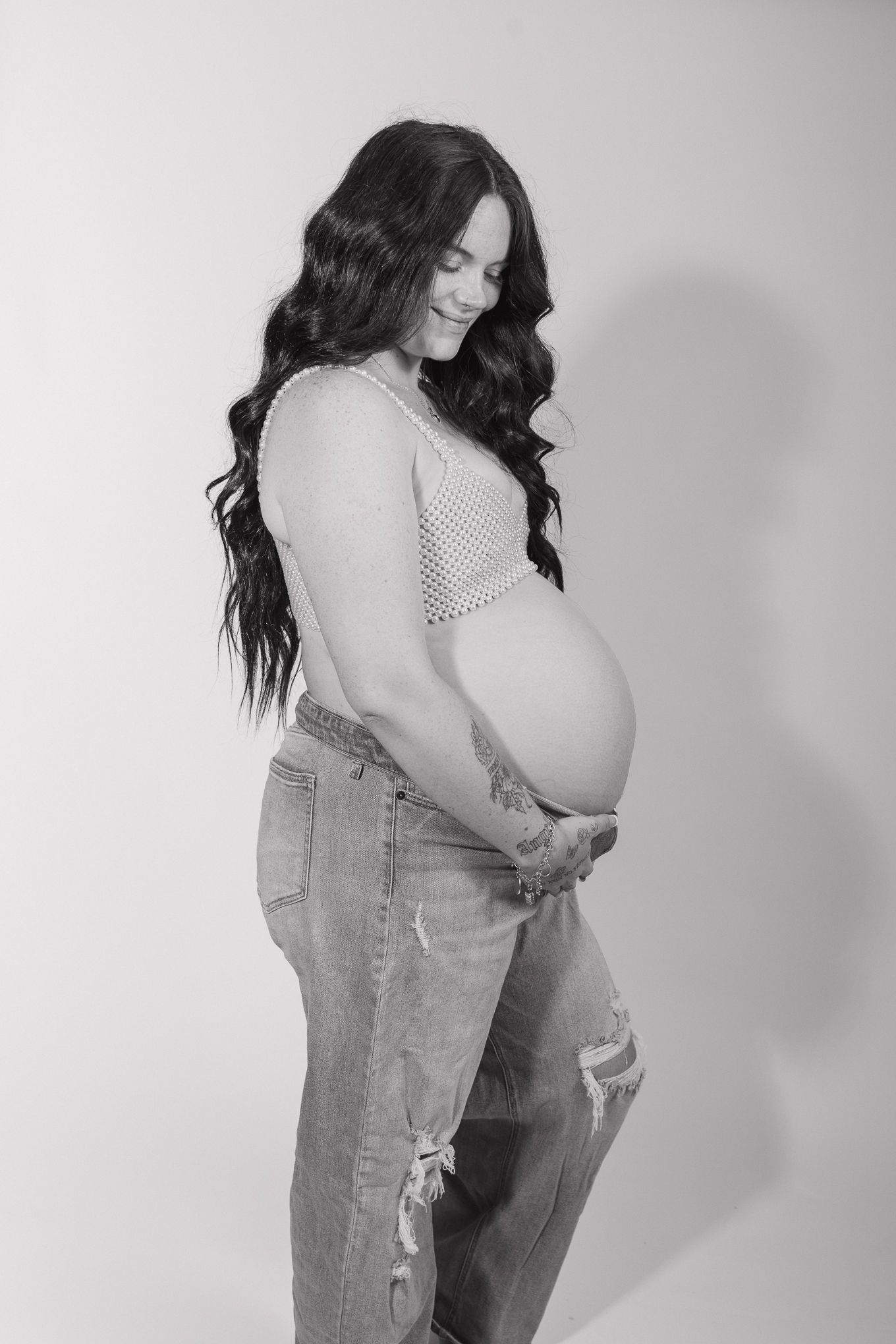 Studio maternity photographer serving Milton, Pensacola, Pace, and surrounding Northwest Florida areas.