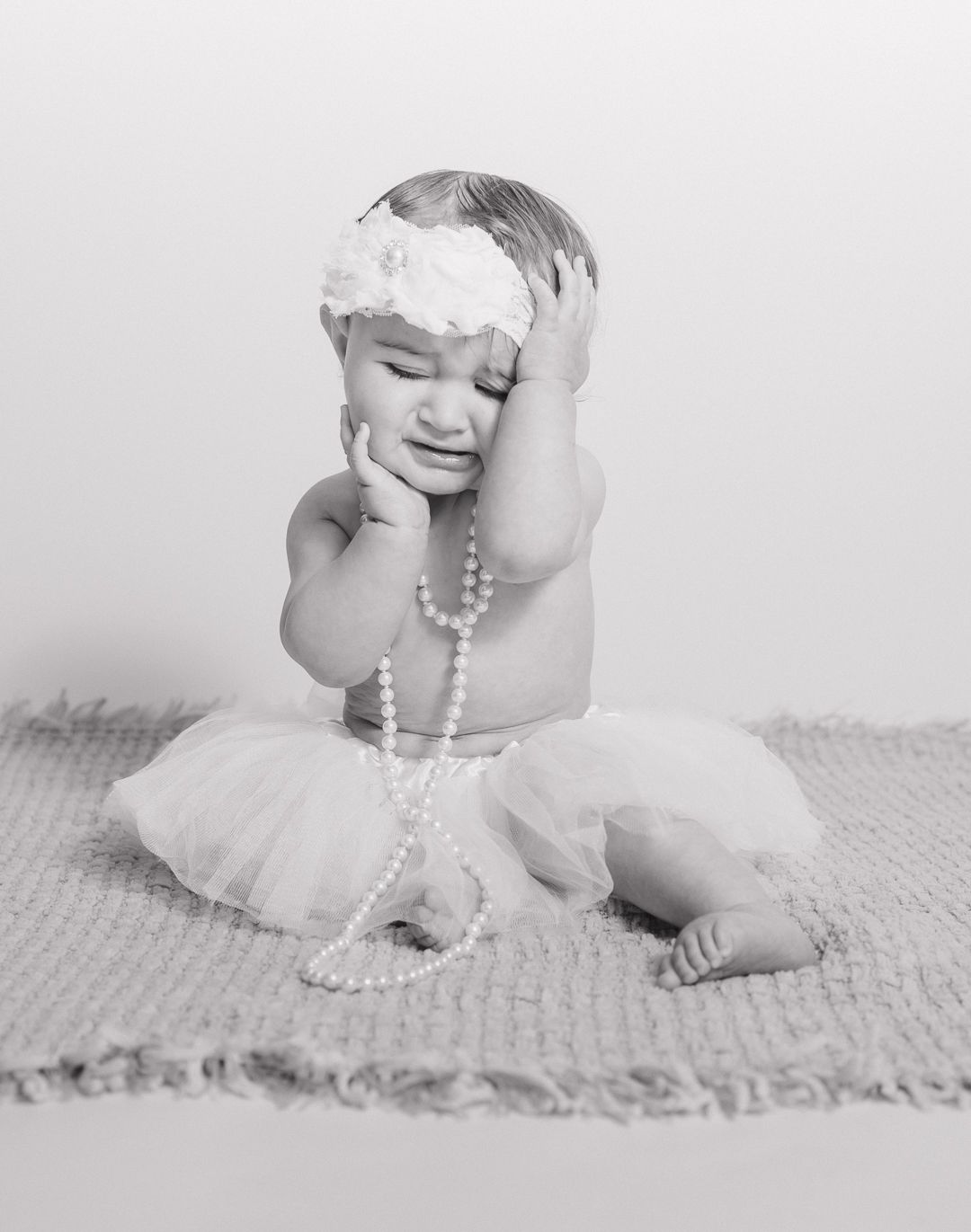 Child milestone photography session in Northwest Florida using a professional mobile studio setup.