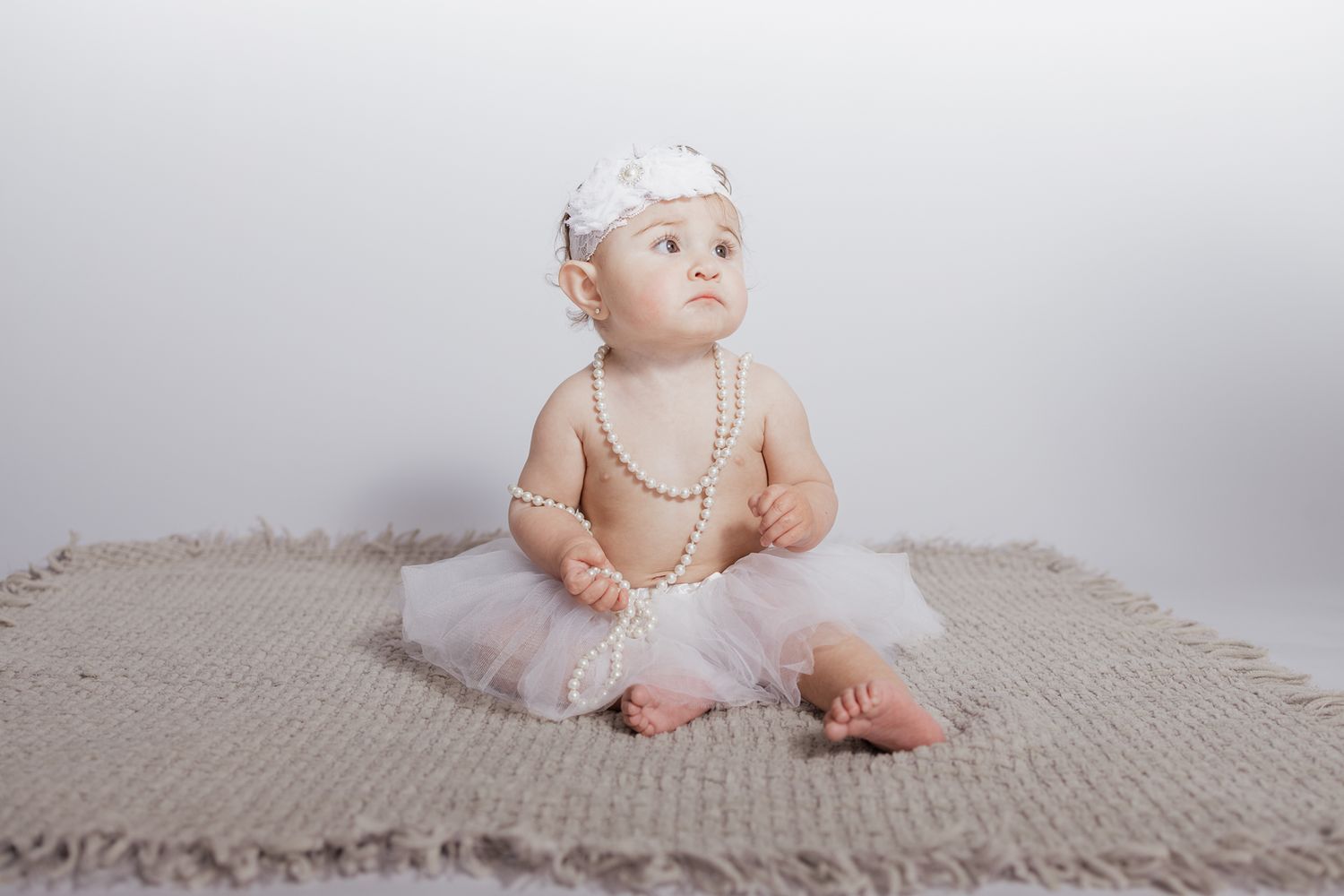 Child milestone photography session in Northwest Florida using a professional mobile studio setup.