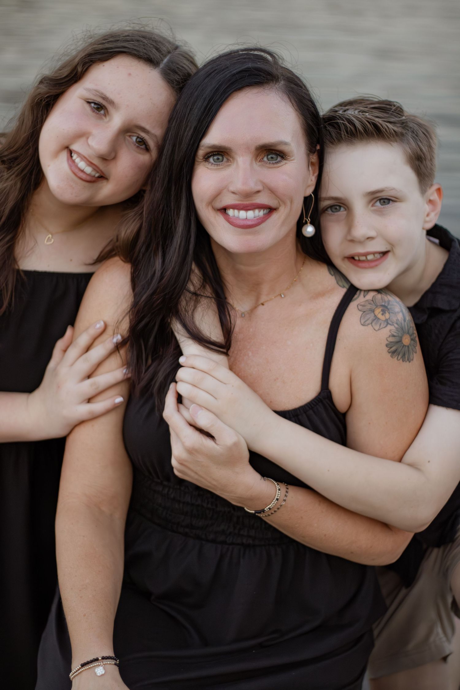 Outdoor family portraits captured in a peaceful park setting in Milton, Florida.