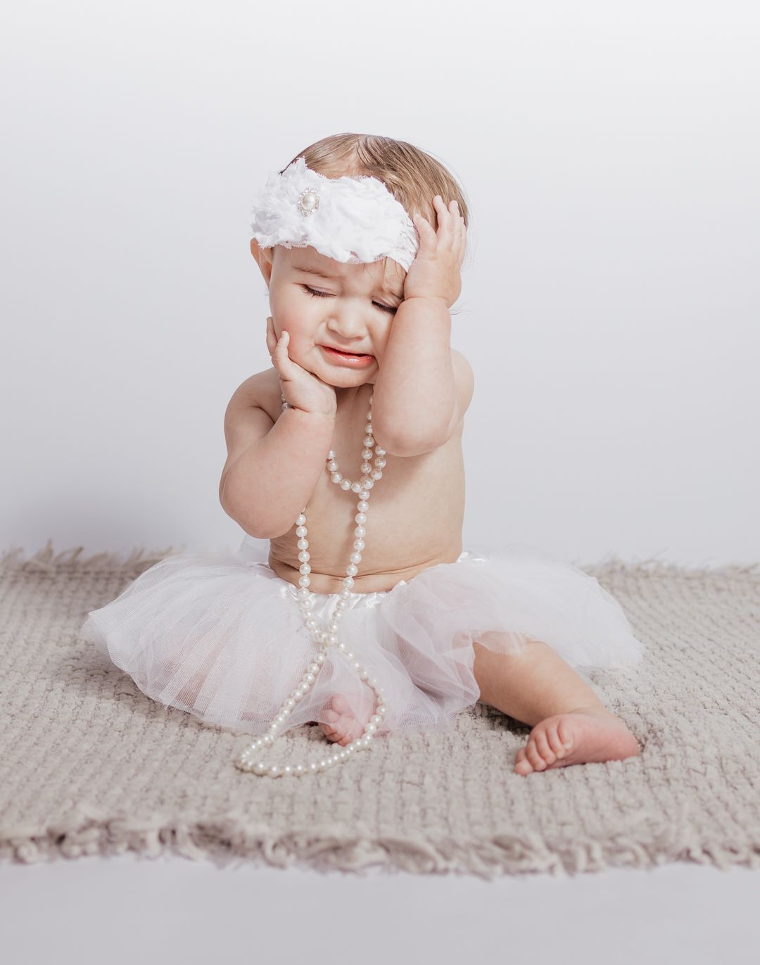 Child milestone photography session in Northwest Florida using a professional mobile studio setup.