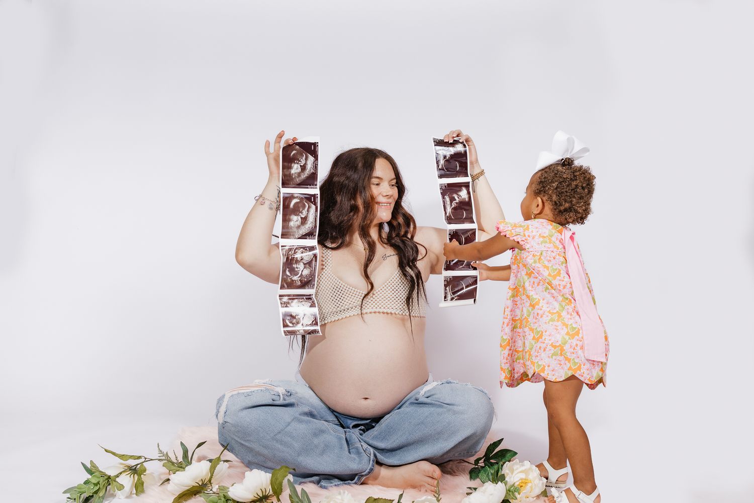 Studio maternity photographer serving Milton, Pensacola, Pace, and surrounding Northwest Florida areas.
