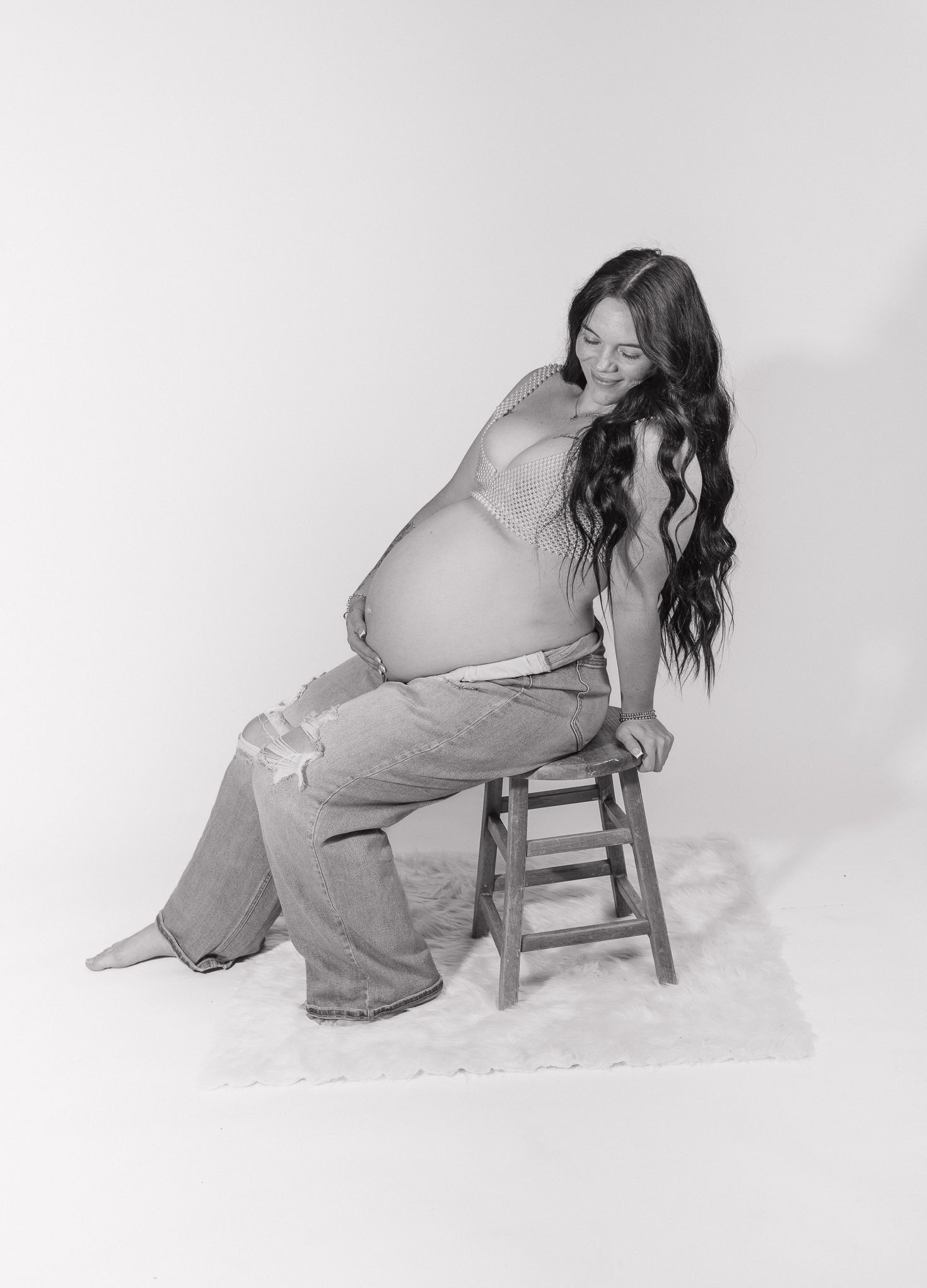Studio maternity photographer serving Milton, Pensacola, Pace, and surrounding Northwest Florida areas.