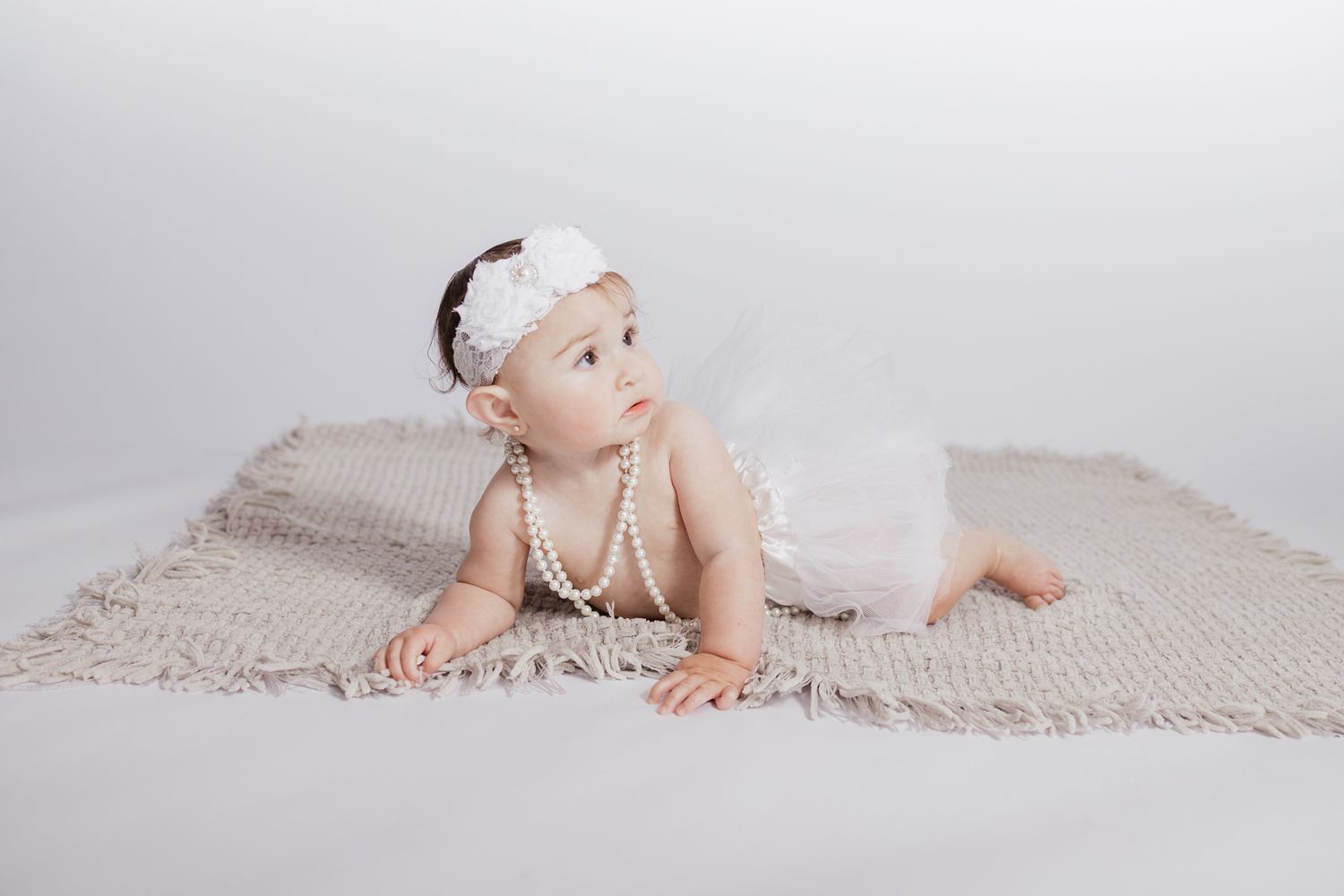 Child milestone photography session in Northwest Florida using a professional mobile studio setup.