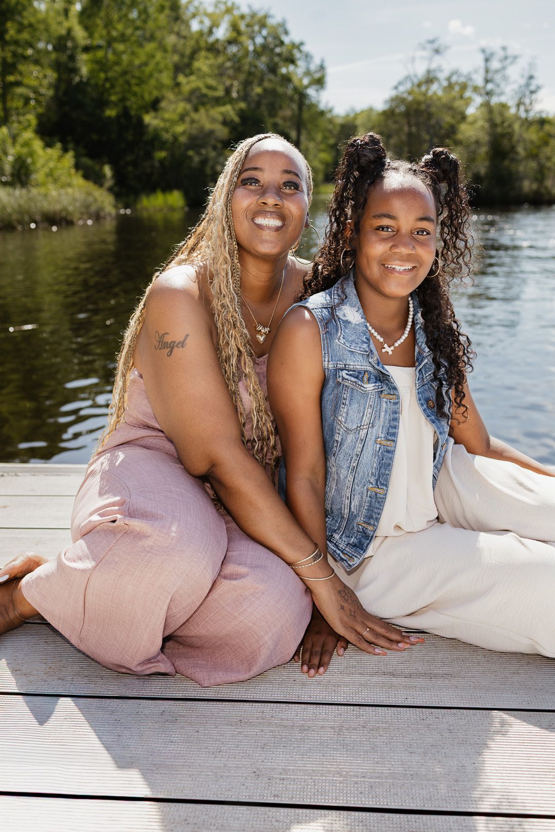 Outdoor family portraits captured in a peaceful park setting in Bagdad, Florida.