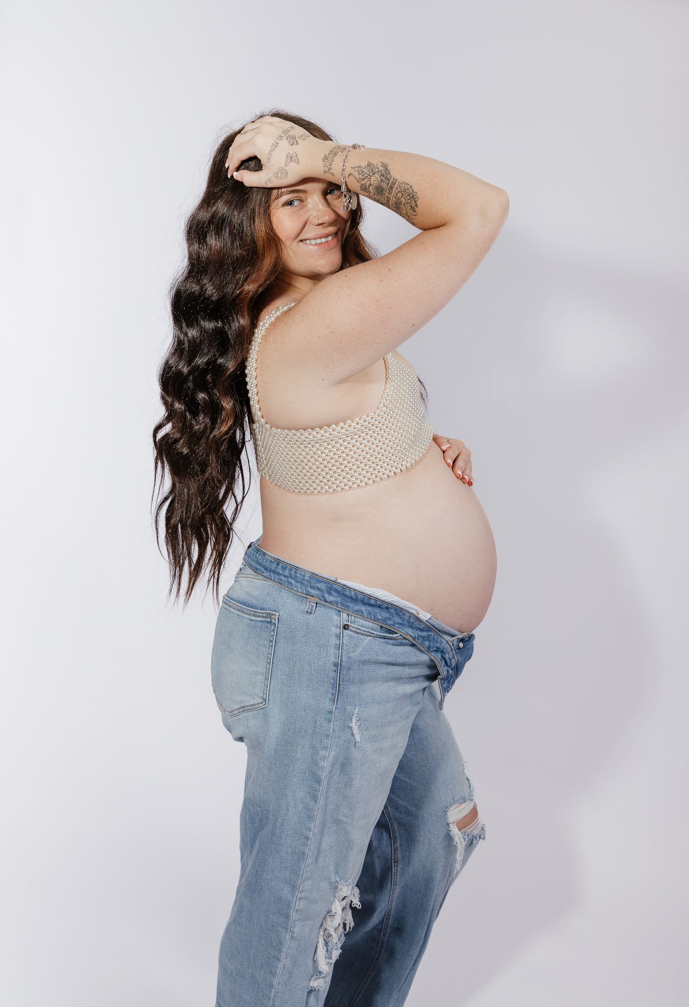 Studio maternity photographer serving Milton, Pensacola, Pace, and surrounding Northwest Florida areas.