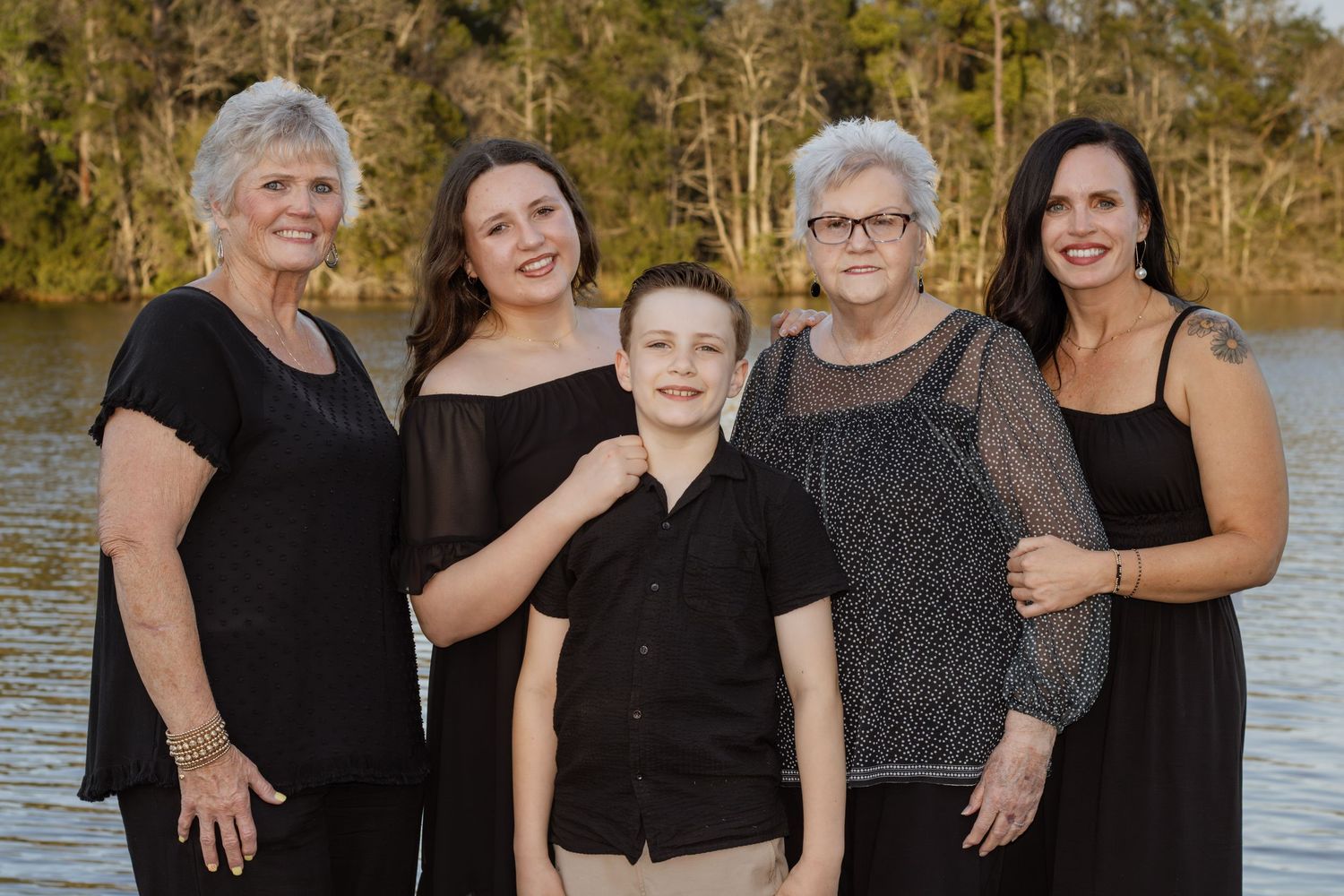 Outdoor family portraits captured in a peaceful park setting in Milton, Florida.