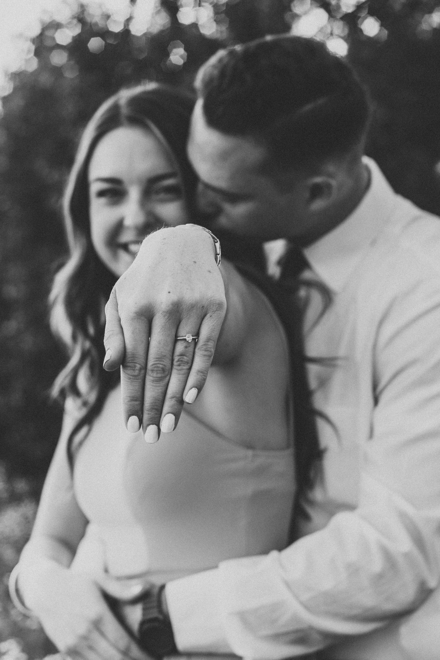 Black and white photo series showing close-up shots of wedding rings and hands.