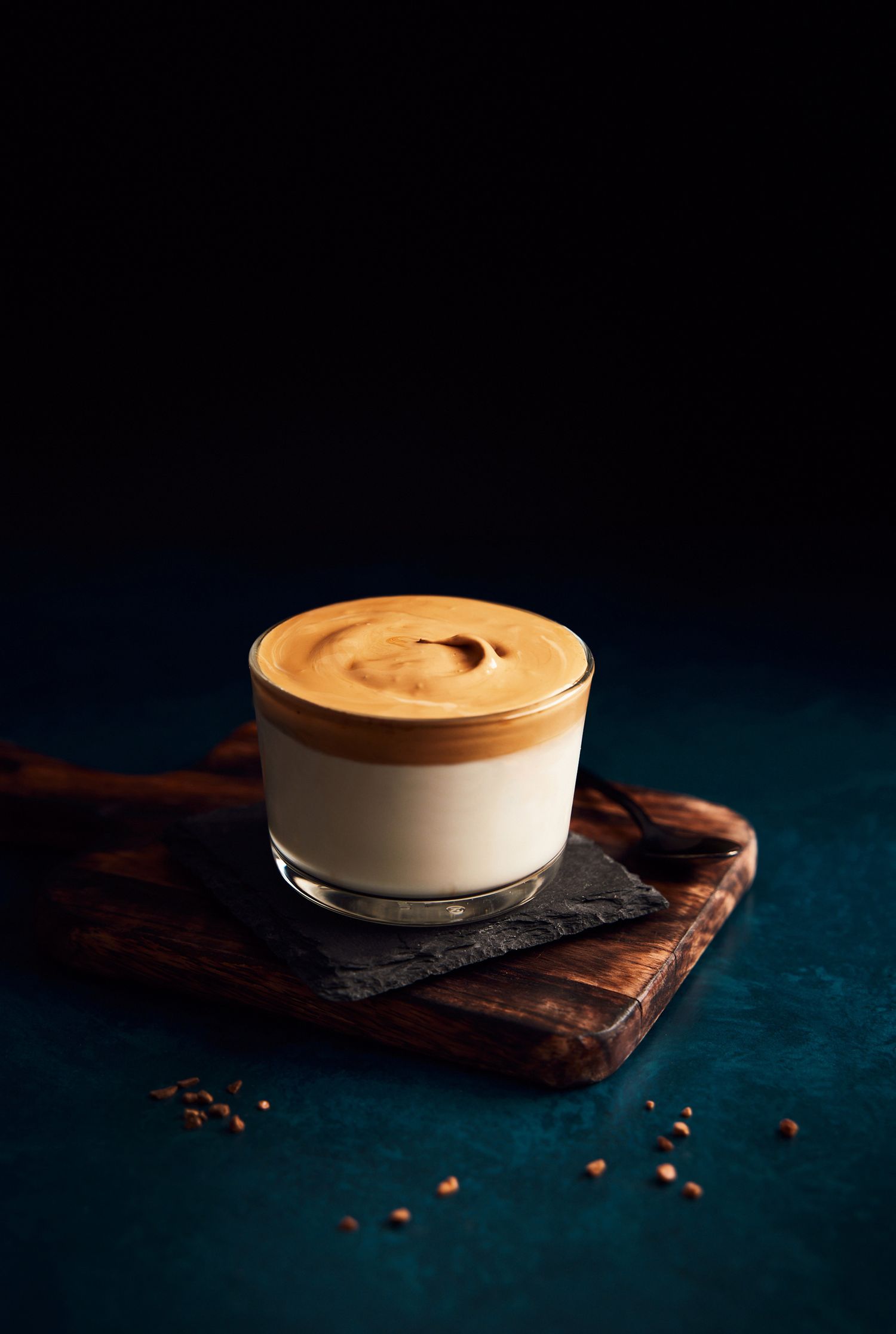 Coffee dalgona on a wooden board