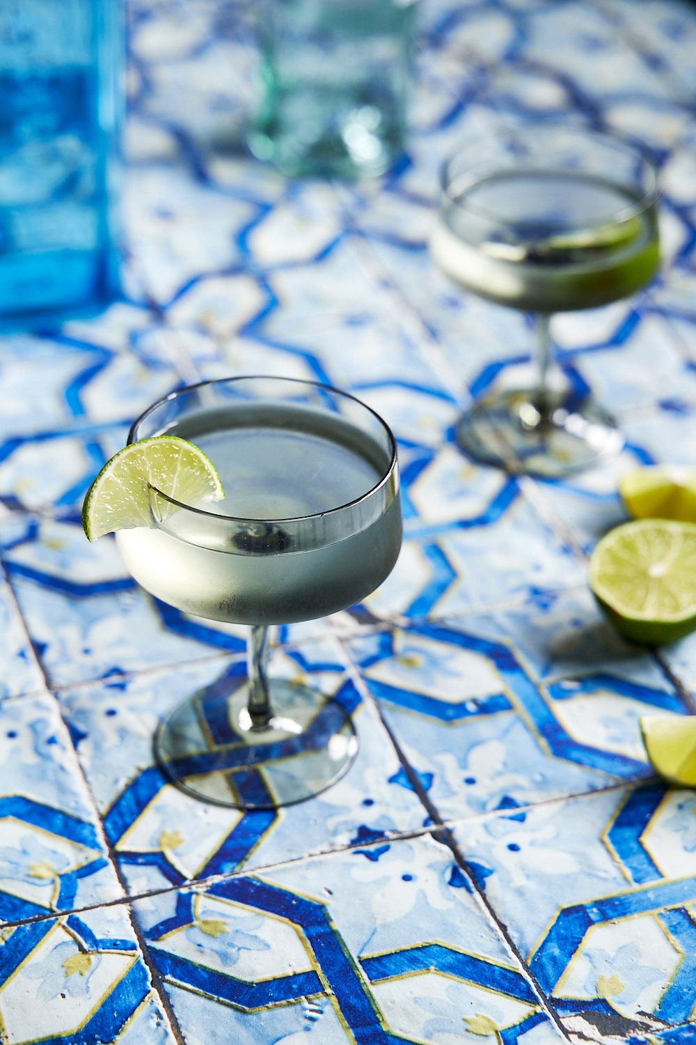 Lime martinis on a tiled table