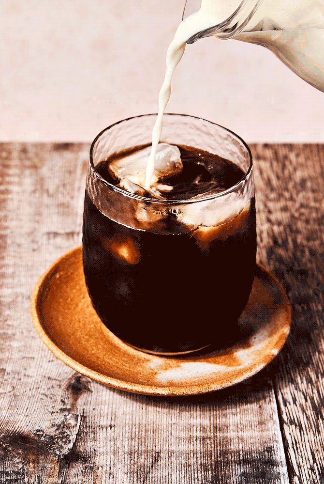 Milk pour stop motion in coffee