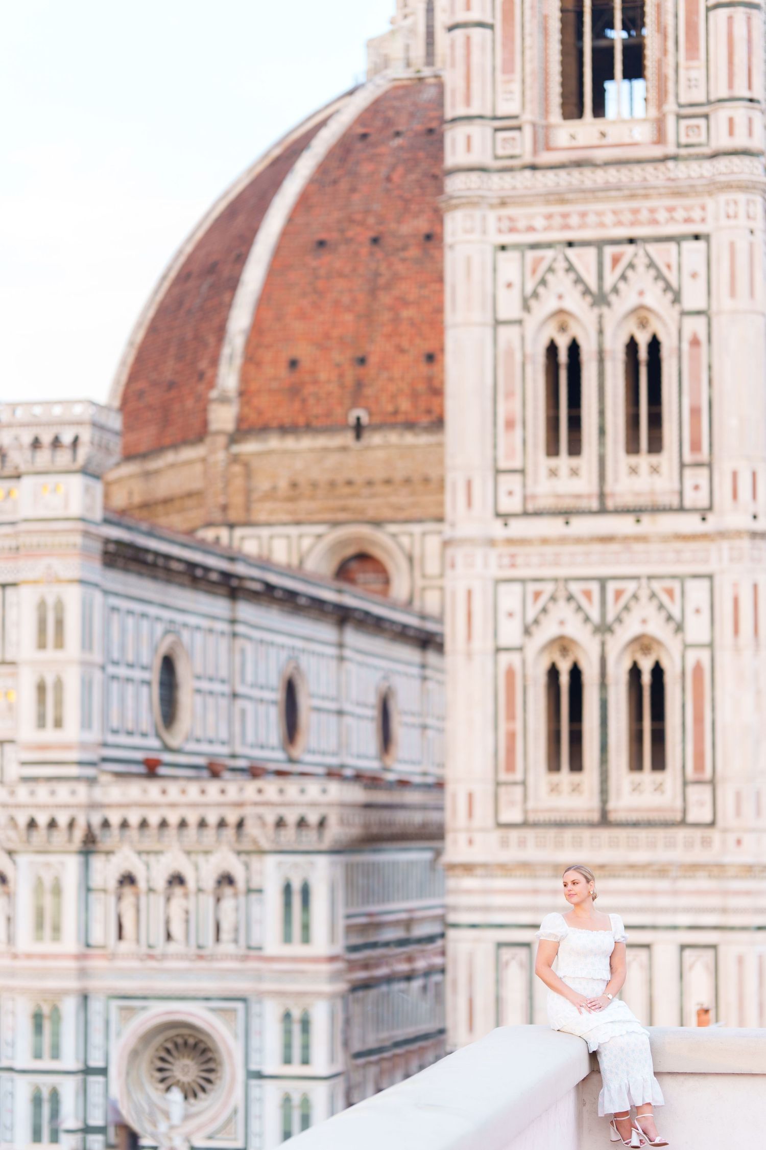 Ornate architecture of Florence Cathedral with its iconic terracotta dome and white marble facade in Italy.