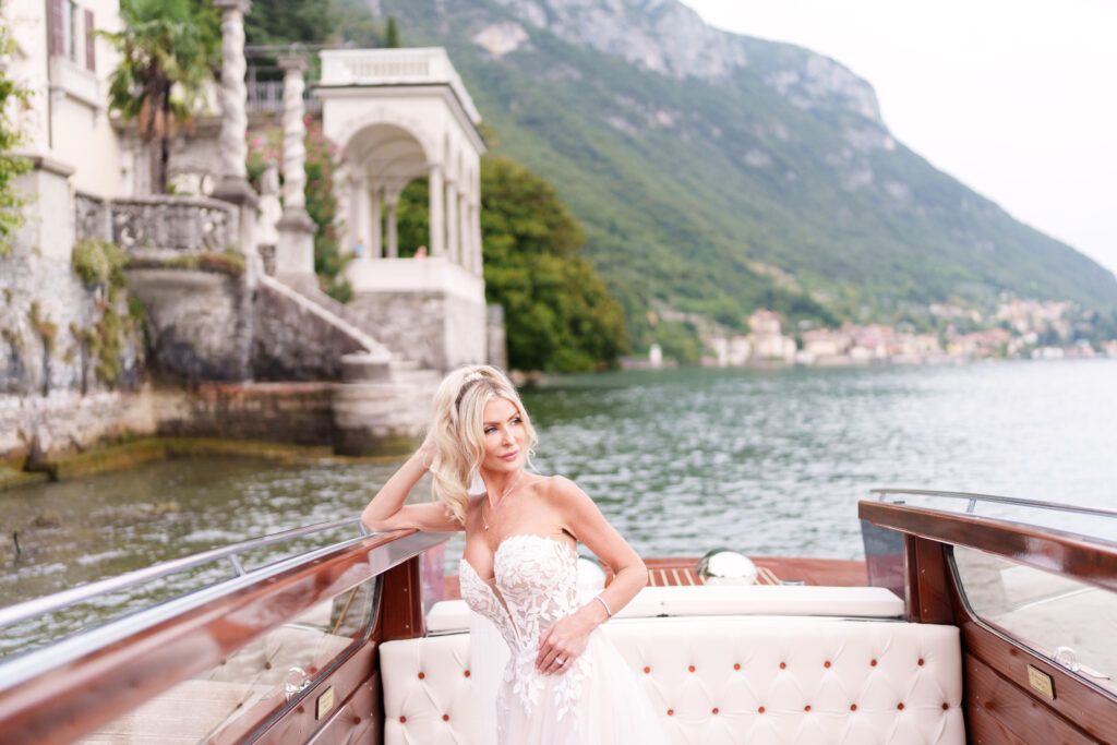 Elegant lakeside terrace with stone columns and mountain views at Villa del Balbianello on Lake Como.