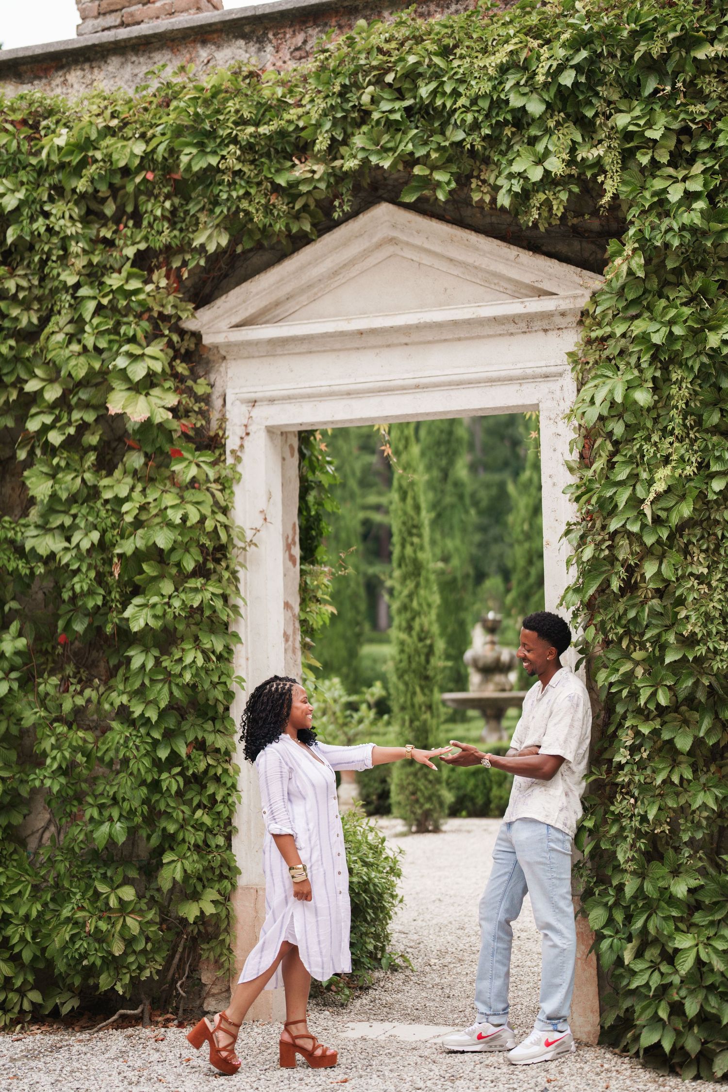 Proposal engagement photographer Verona capturing emotional couple portraits in historic Italian gardens