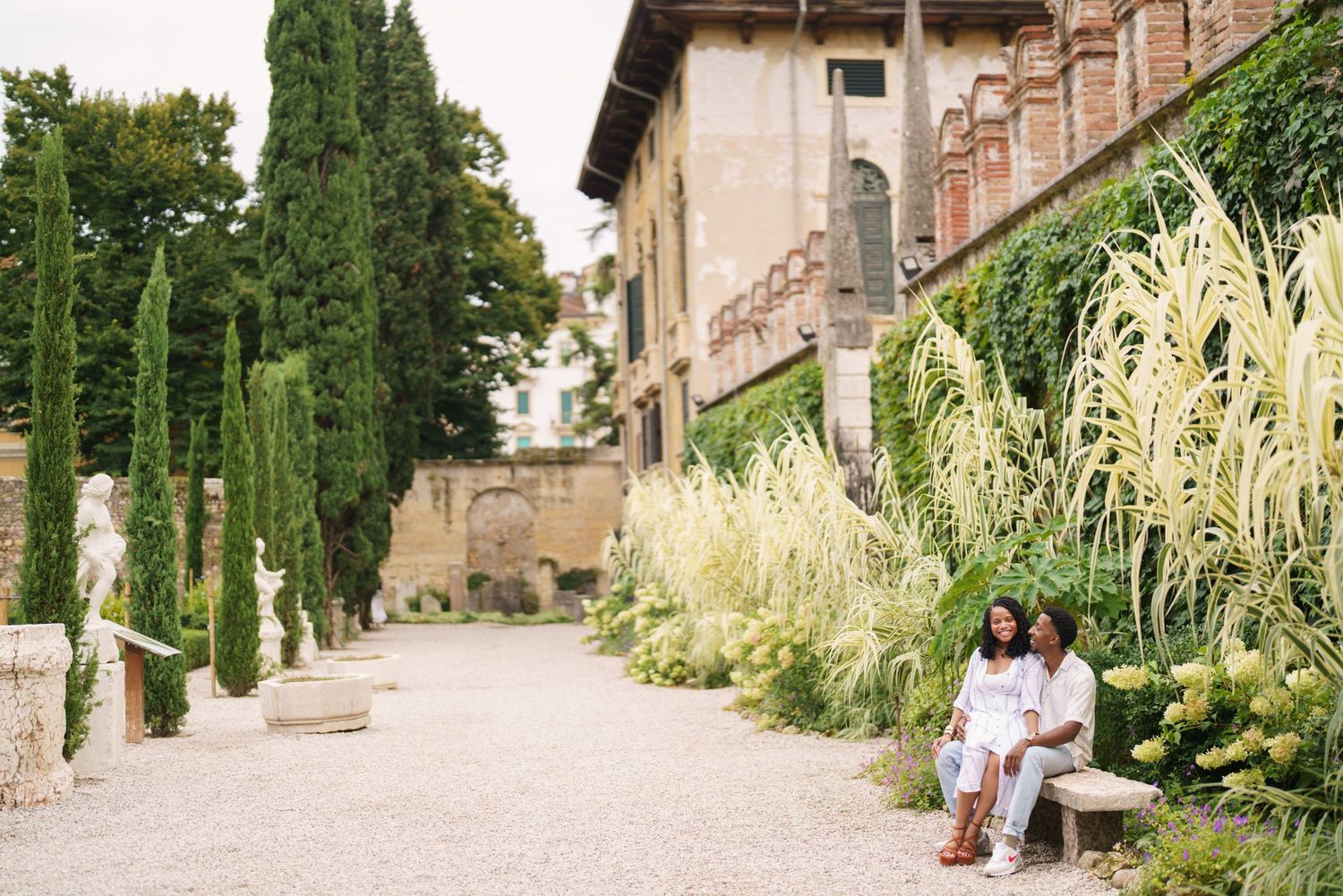 Proposal engagement photographer Verona capturing emotional couple portraits in historic Italian gardens