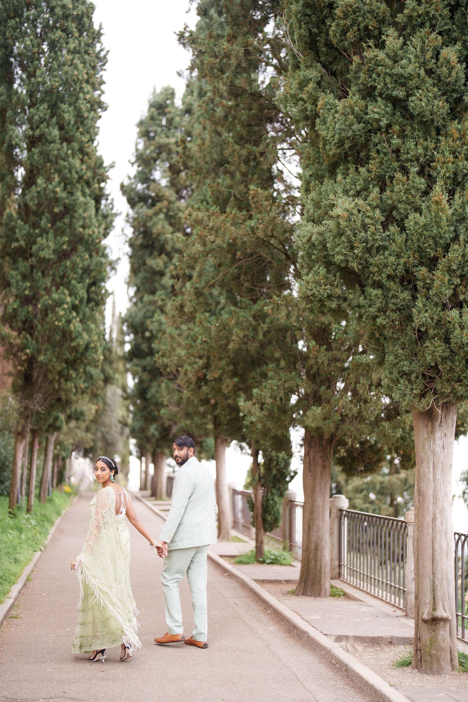 romantic couple walking ponte pietra verona photographer elegant couple photoshoot verona italy