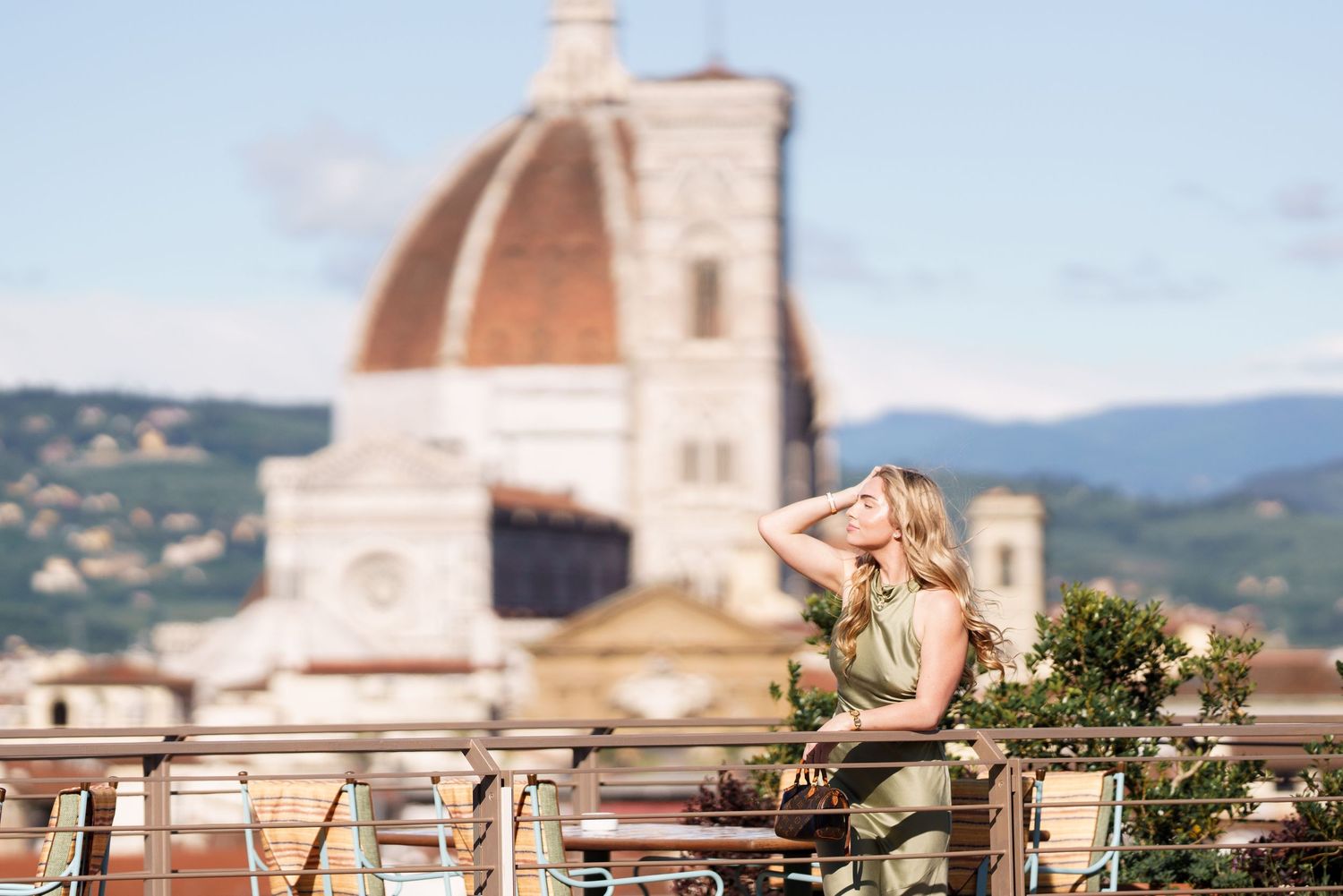 Romantic sunset photoshoot overlooking Florence's historic skyline and famous Duomo.