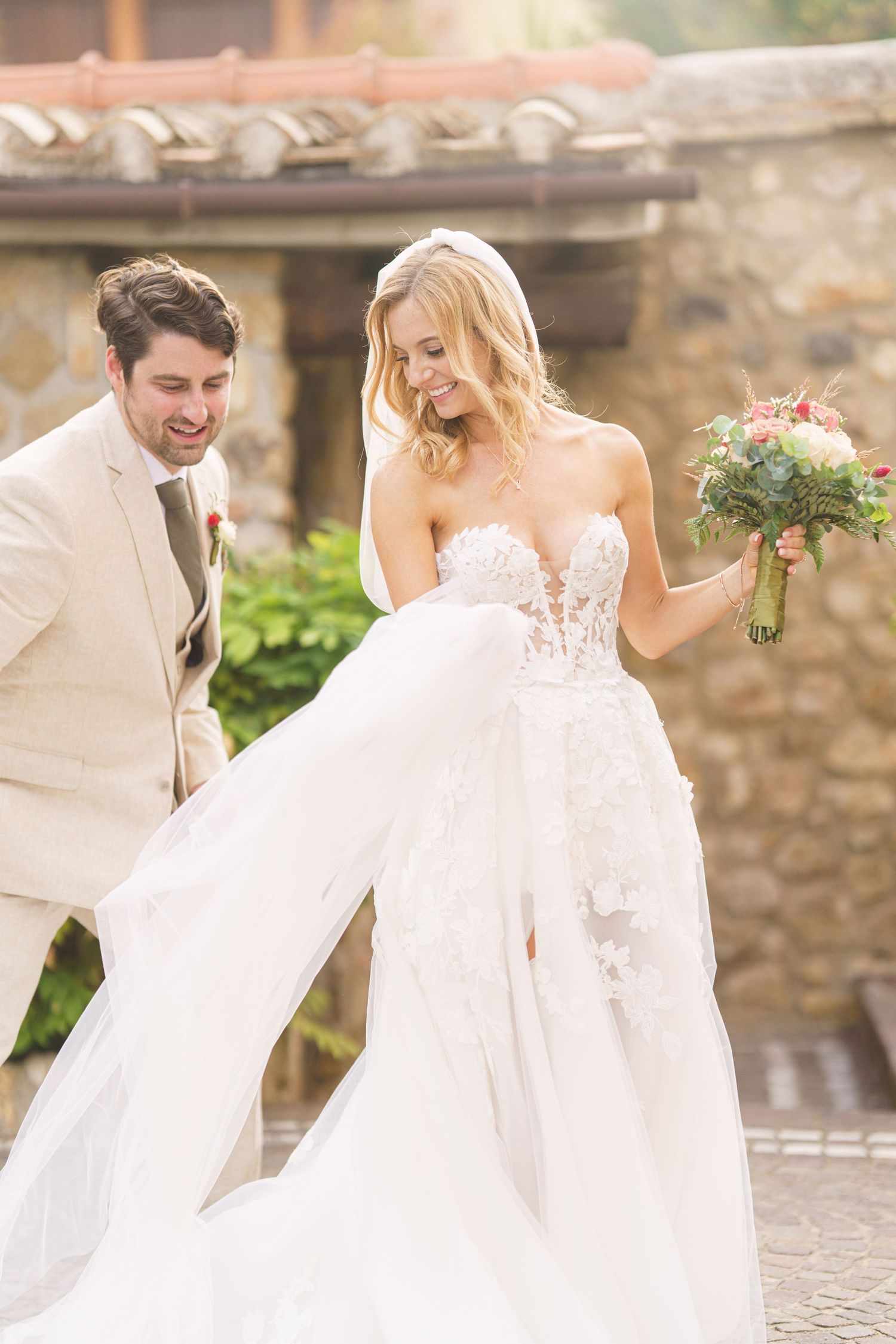 Romantic wedding couple shares playful moments in a series of candid shots against a stone wall backdrop.