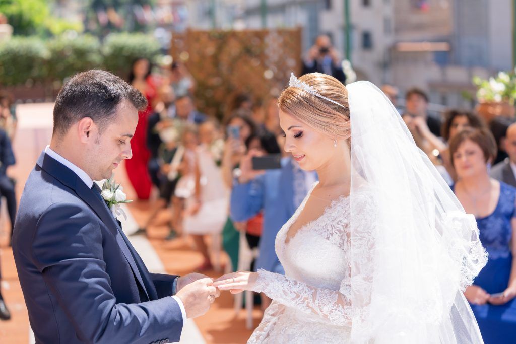 Wedding celebration captured in a series of candid moments during the ceremony.