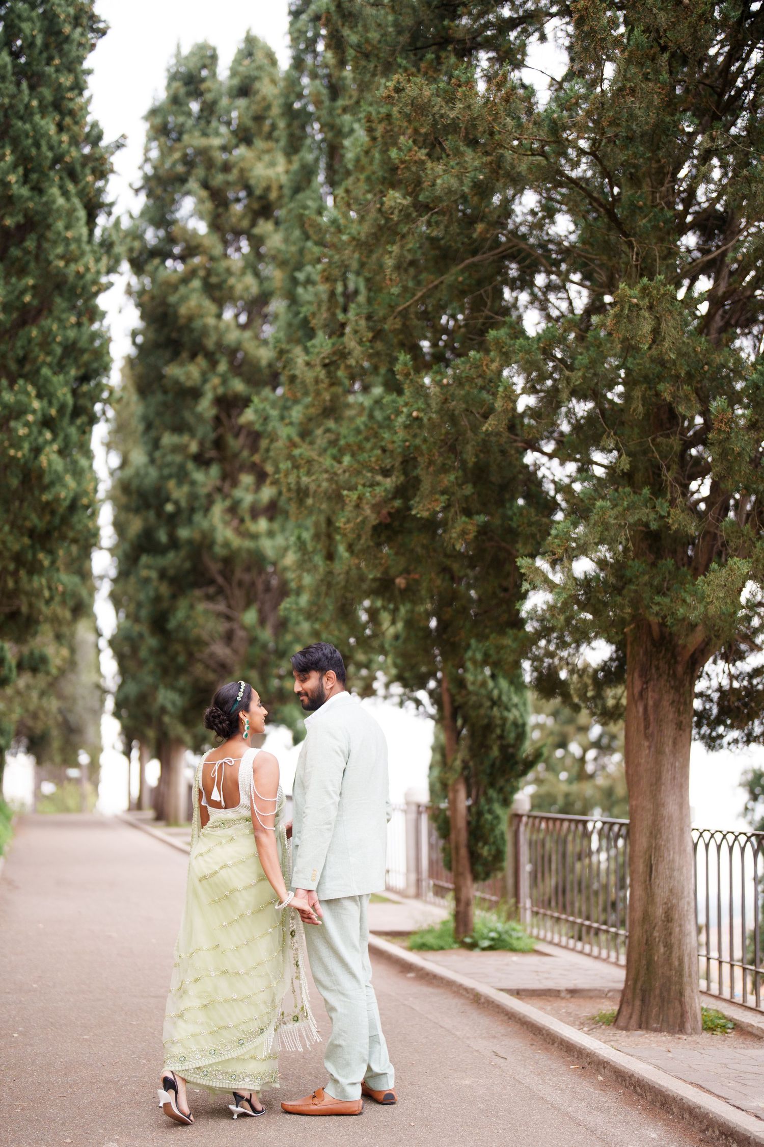 photographer verona romantic couple walking ponte pietra verona photographer elegant couple photoshoot verona italy