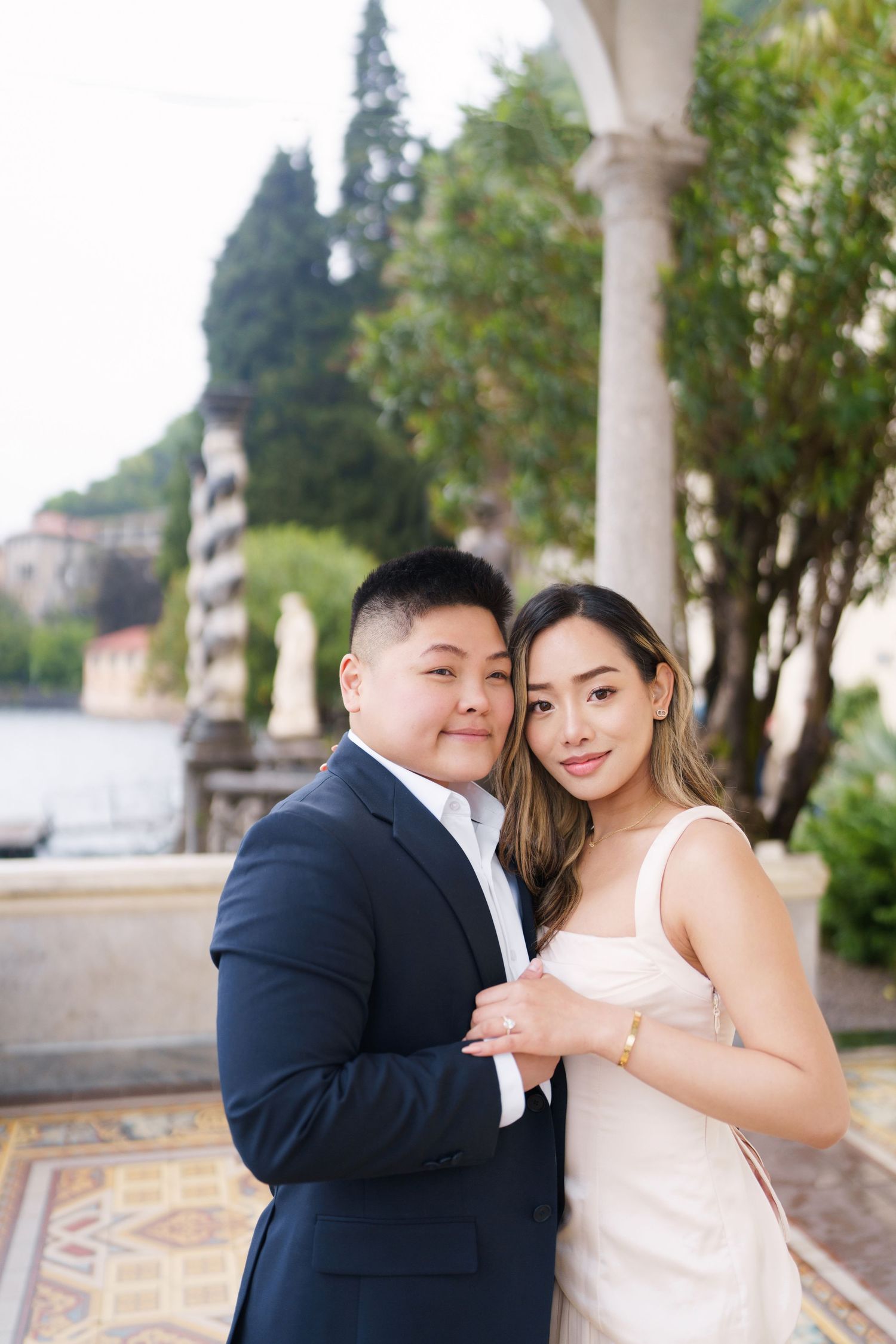 Lake Como proposal photographer capturing surprise engagement at Villa Monastero in Varenna