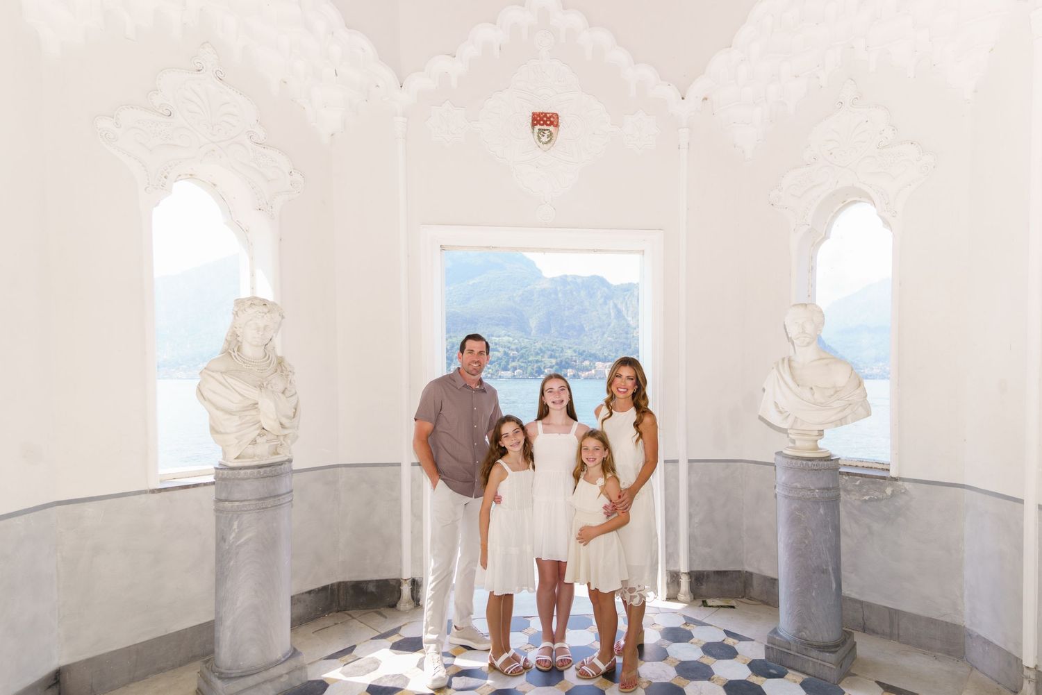 Family portrait at Villa Melzi with Lake Como mountains in Bellagio
