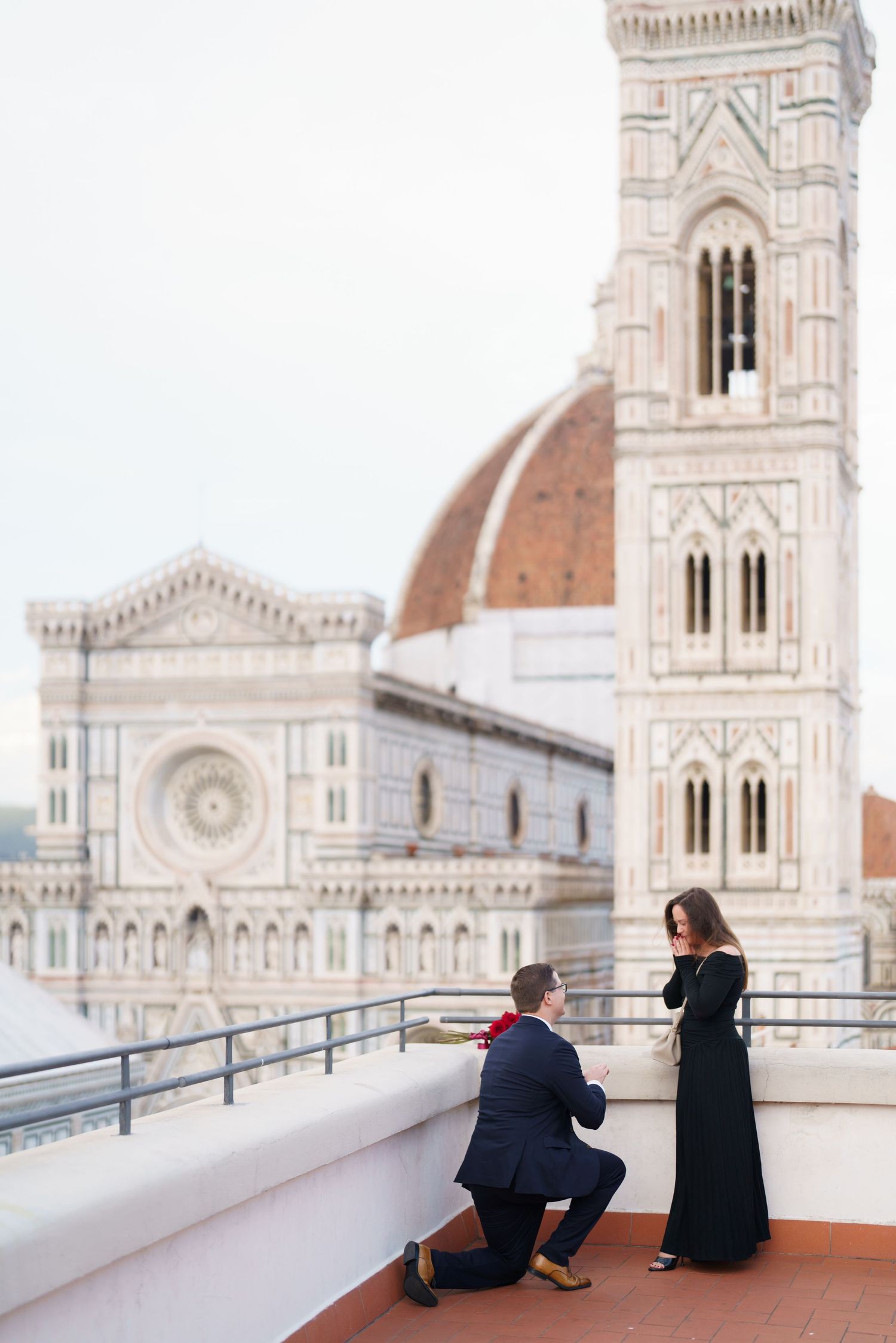 A series of photos showing people sitting on a terrace overlooking the Florence Cathedral's iconic white marble facade.