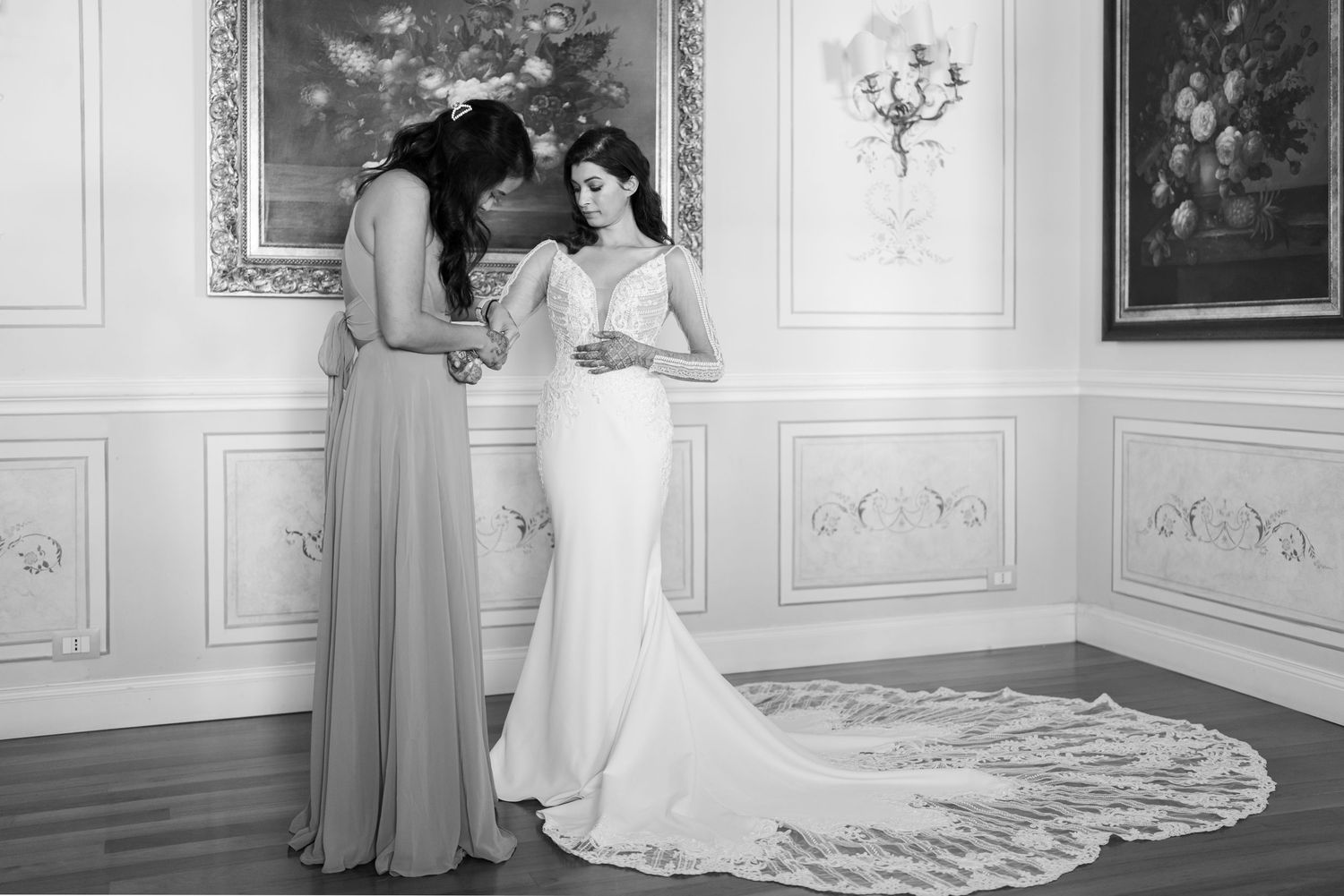 Black and white photos capture elegant moments in a formal room with ornate details.