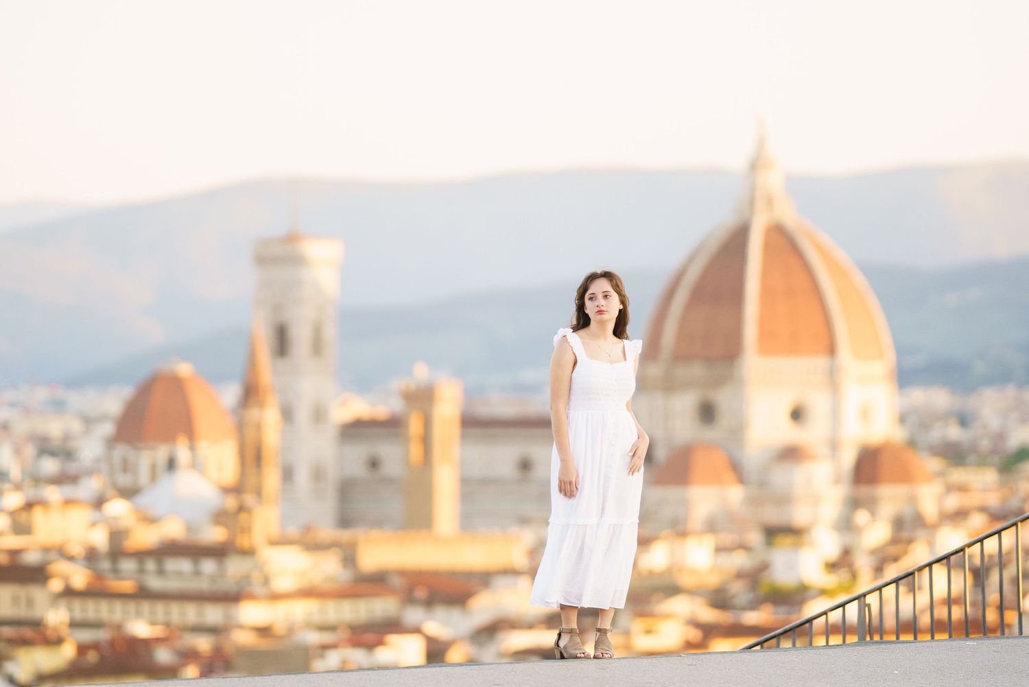 photographer Florence Italy skyline with iconic Duomo cathedral dome and historic architecture at sunset.