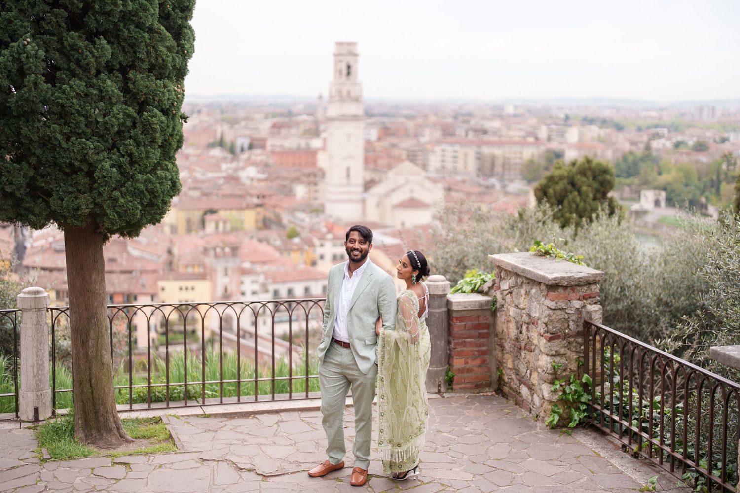 romantic couple walking ponte pietra verona photographer elegant couple photoshoot verona italy