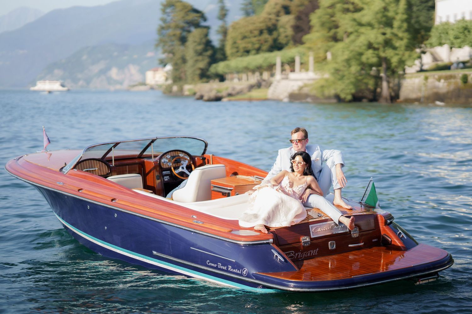 luxury lake como photoshoot with classic wooden boat