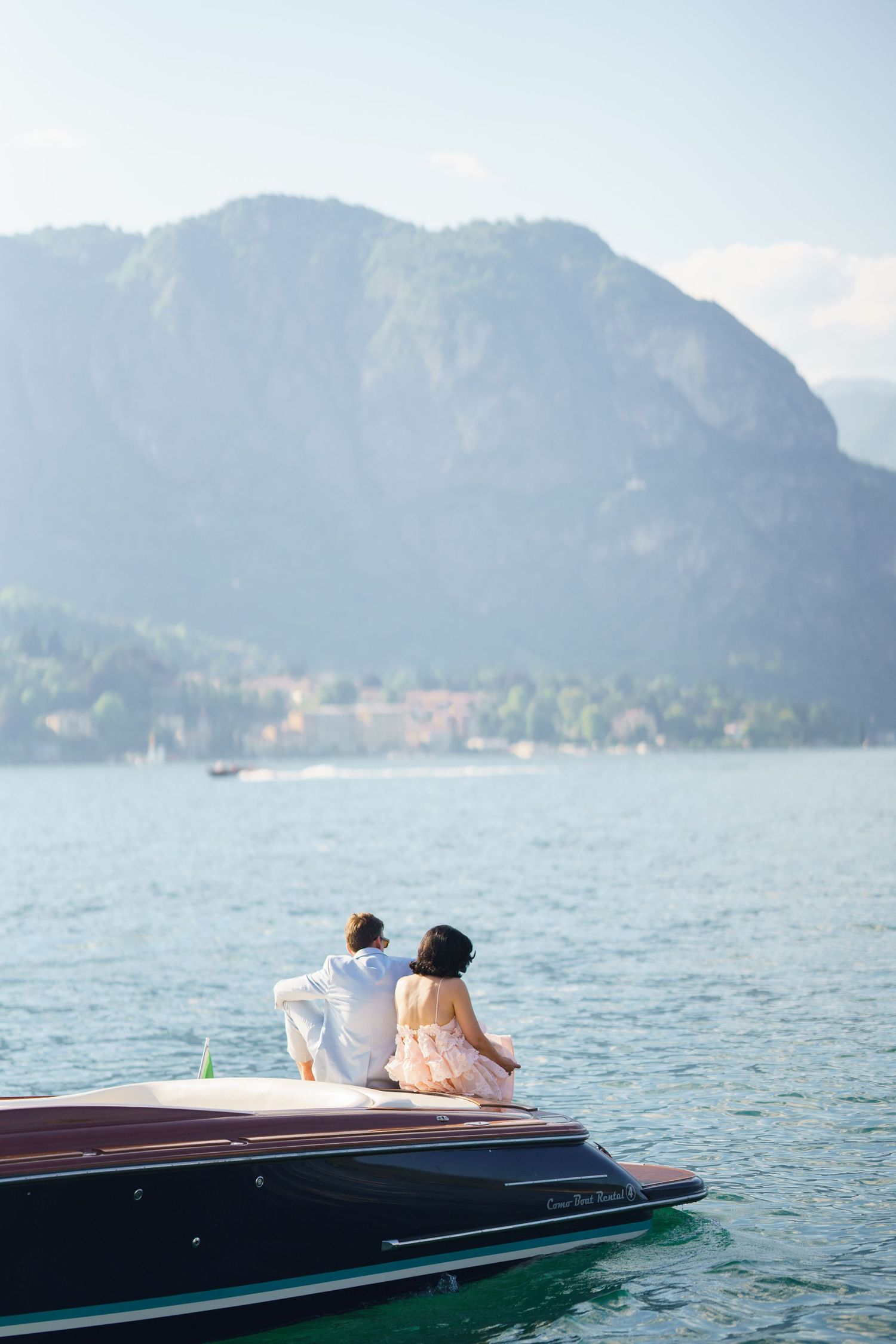 luxury lake como photoshoot with classic wooden boat