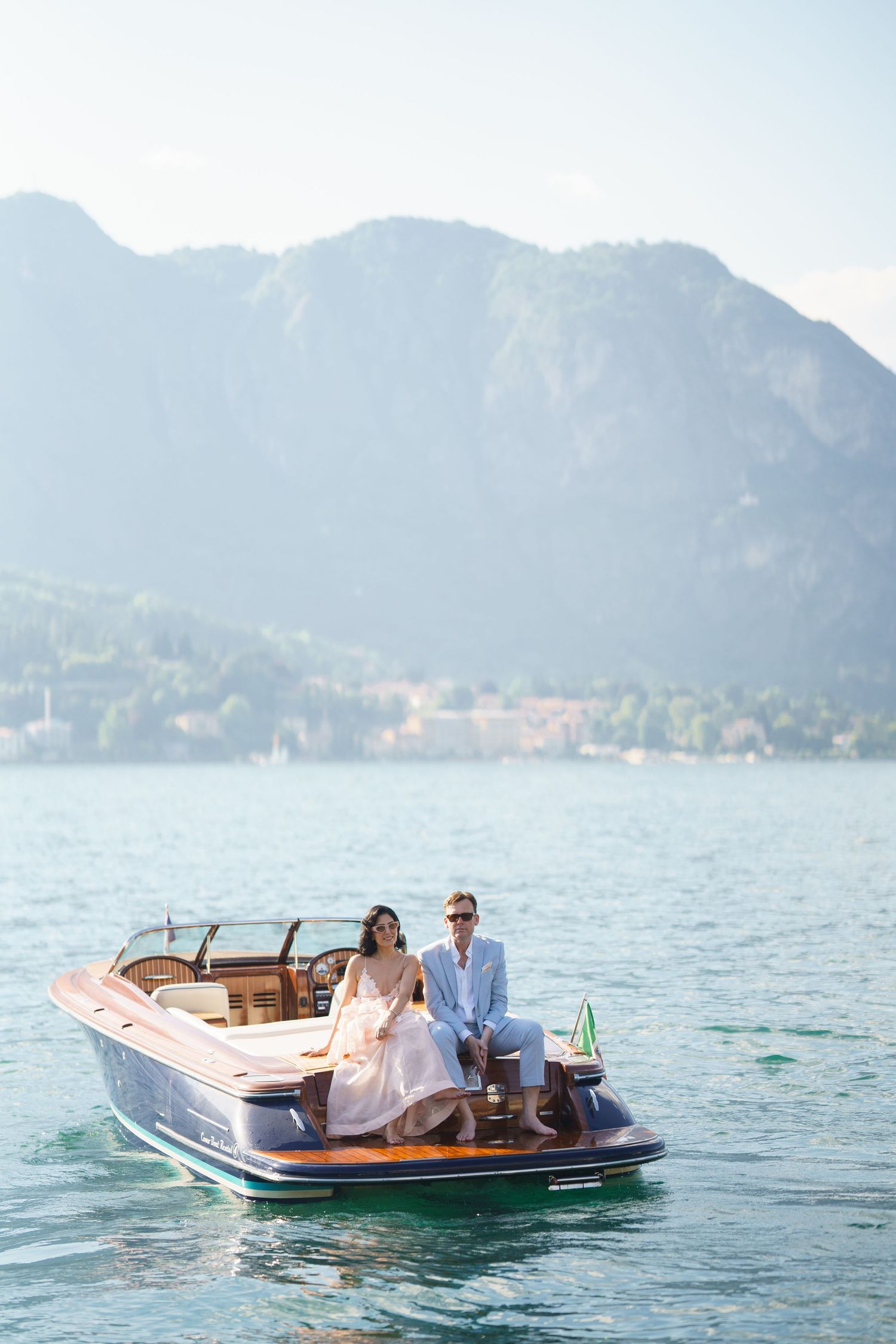 luxury lake como photoshoot with classic wooden boat