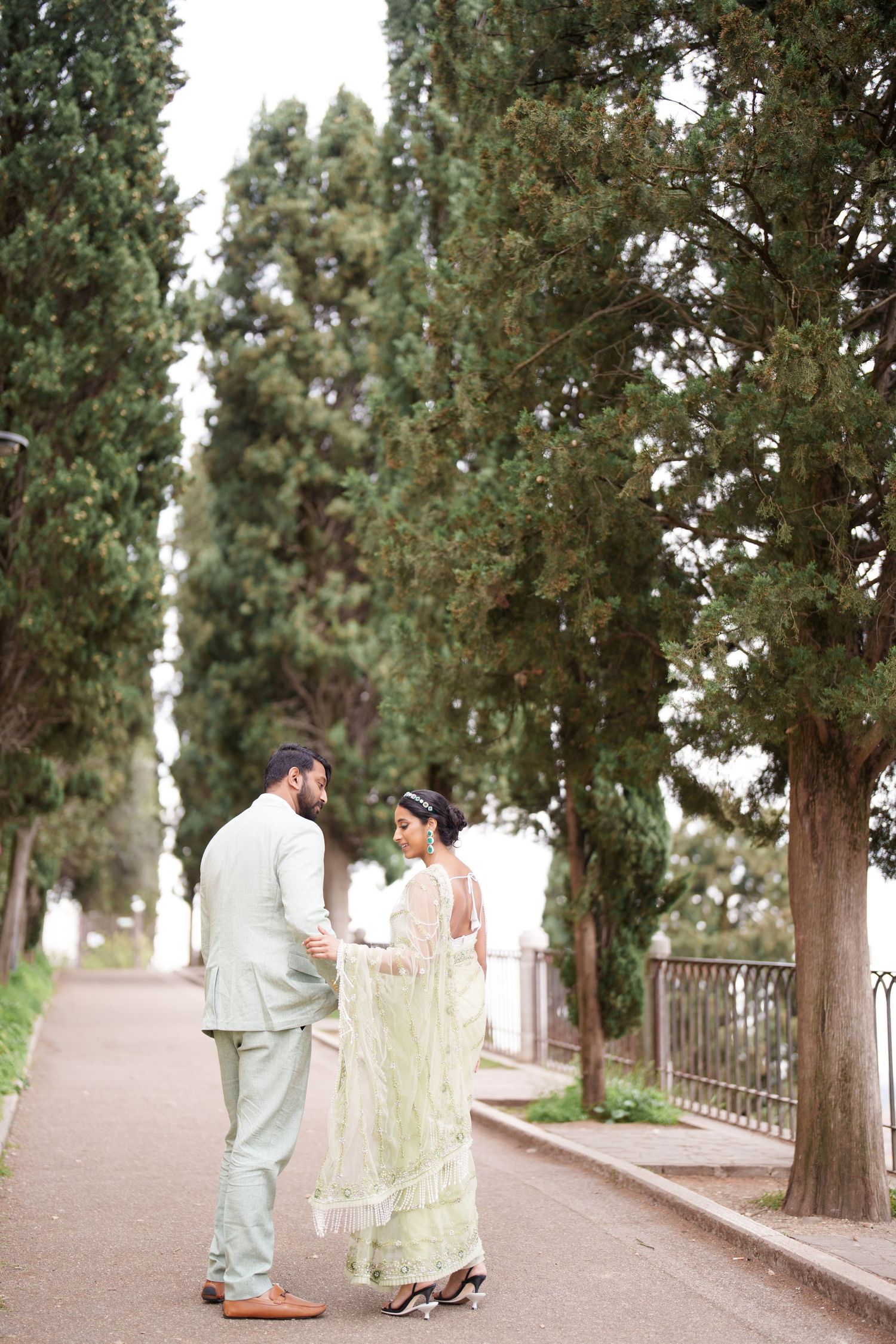 photographer verona romantic couple walking ponte pietra verona photographer elegant couple photoshoot verona italy