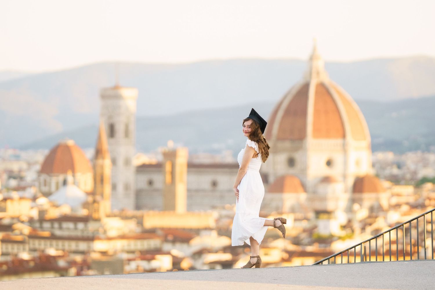 photographer Florence Italy skyline with iconic Duomo cathedral dome and historic architecture at sunset.