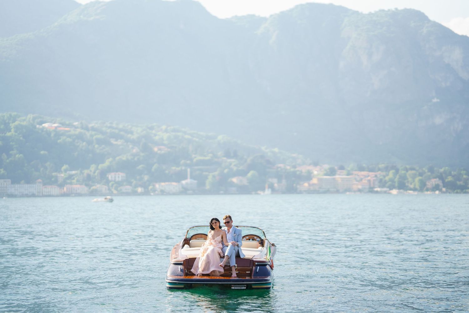 luxury lake como photoshoot with classic wooden boat