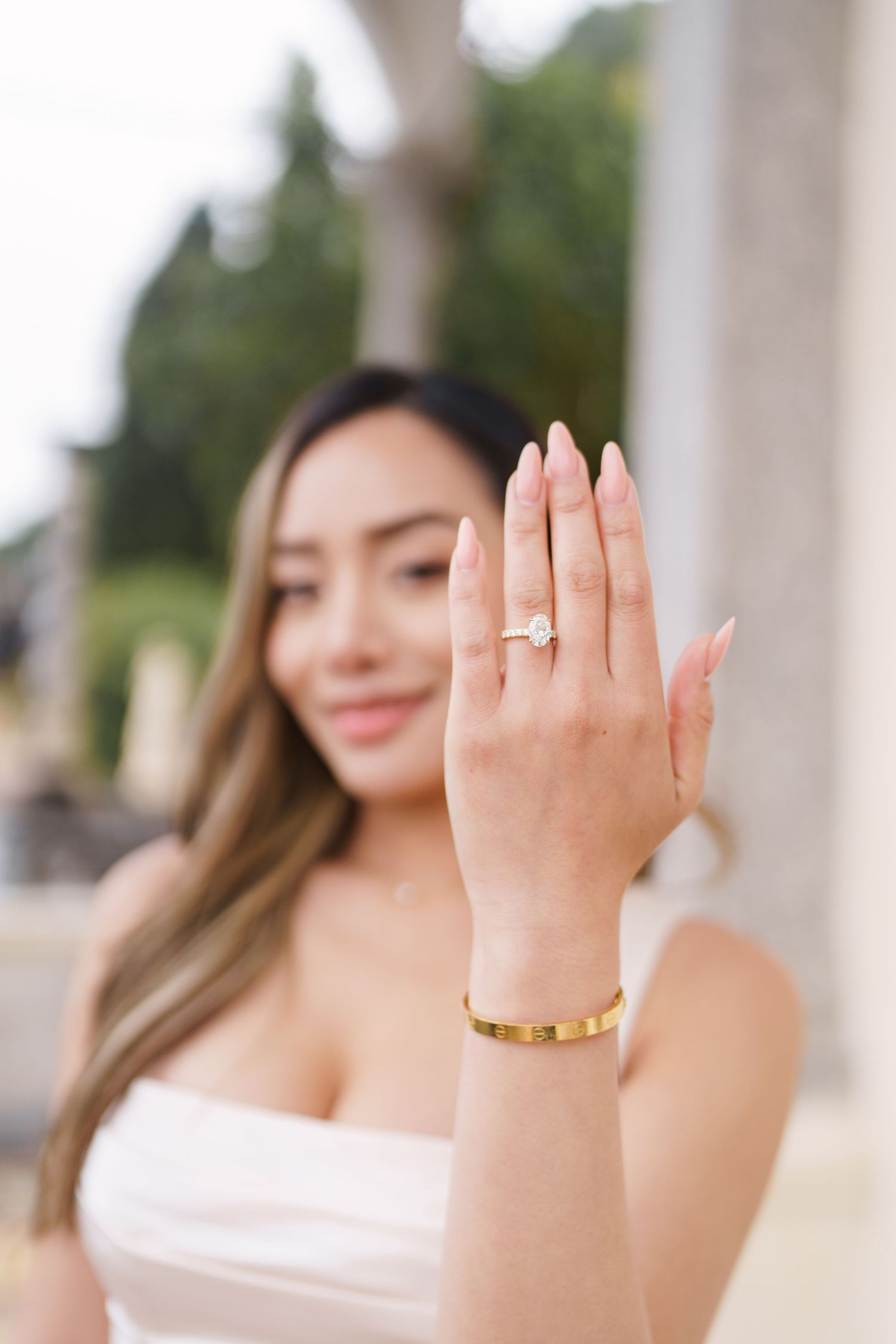 Lake Como proposal photographer capturing surprise engagement at Villa Monastero in Varenna