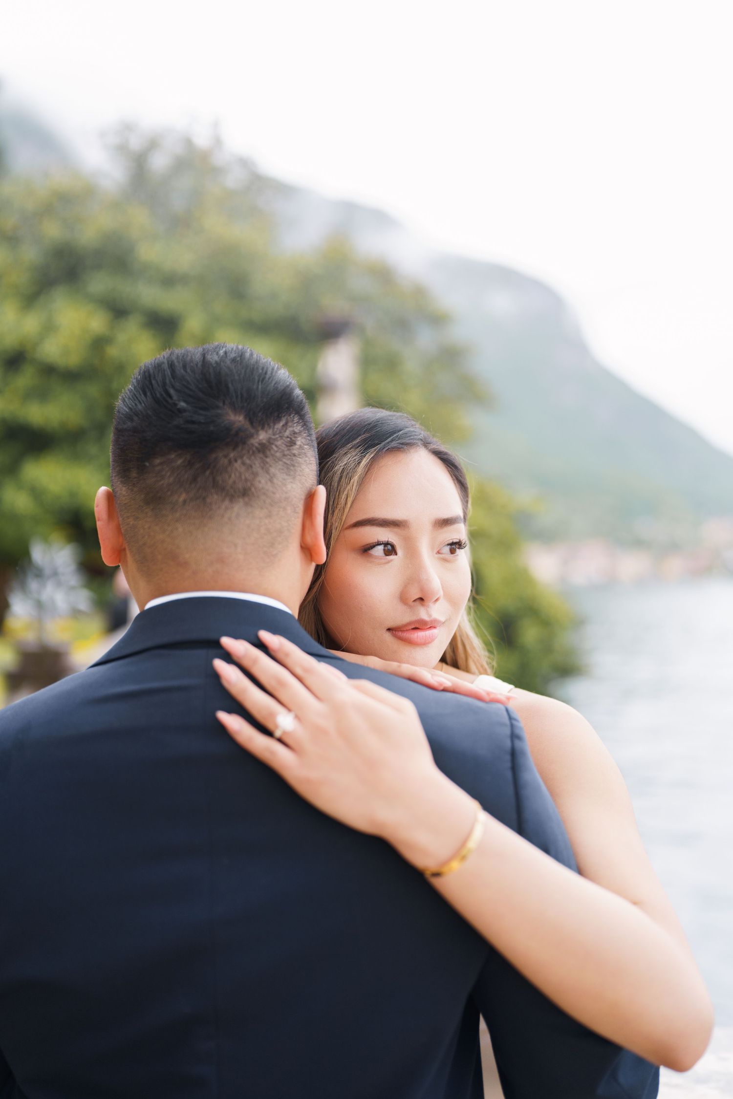 Lake Como proposal photographer capturing surprise engagement at Villa Monastero in Varenna