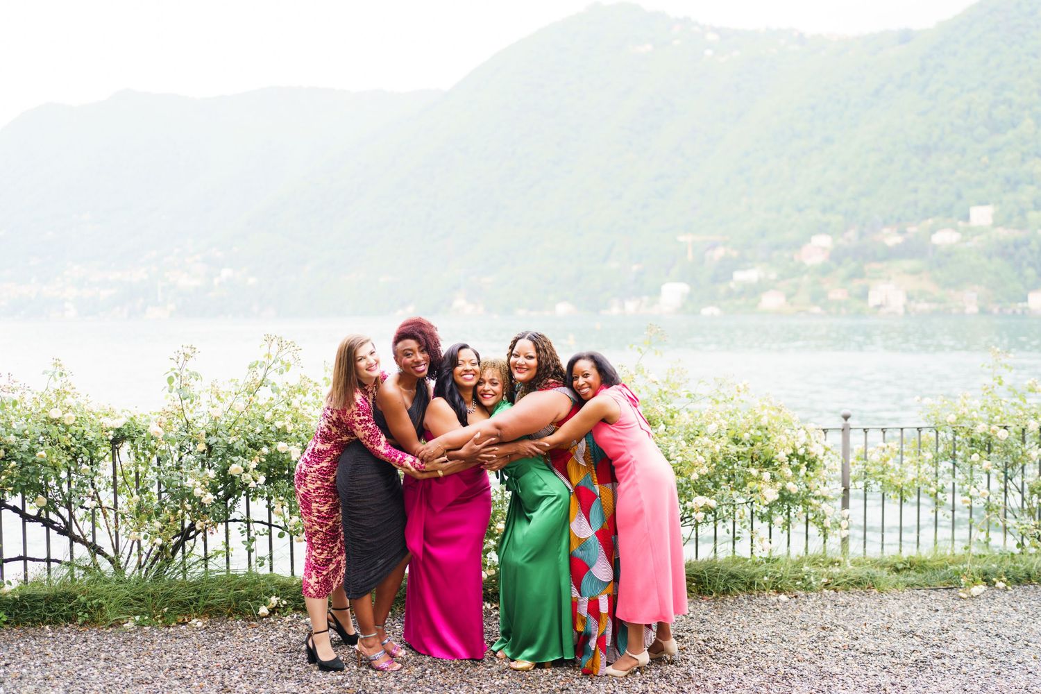 Elegant women group portrait overlooking Lake Como celebration