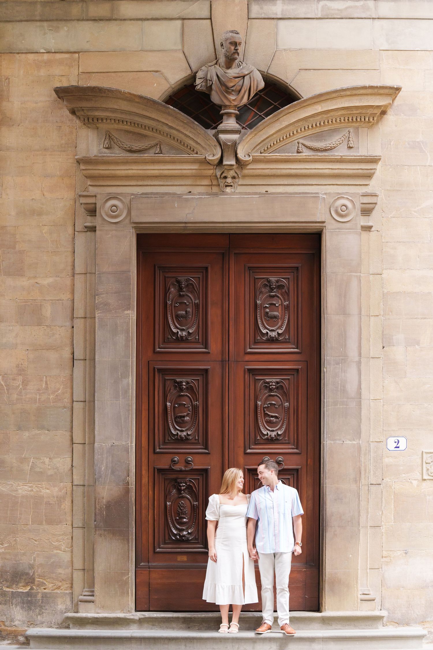 A series of architectural photographs showing ornate wooden doors and stone entryways of a historic building.