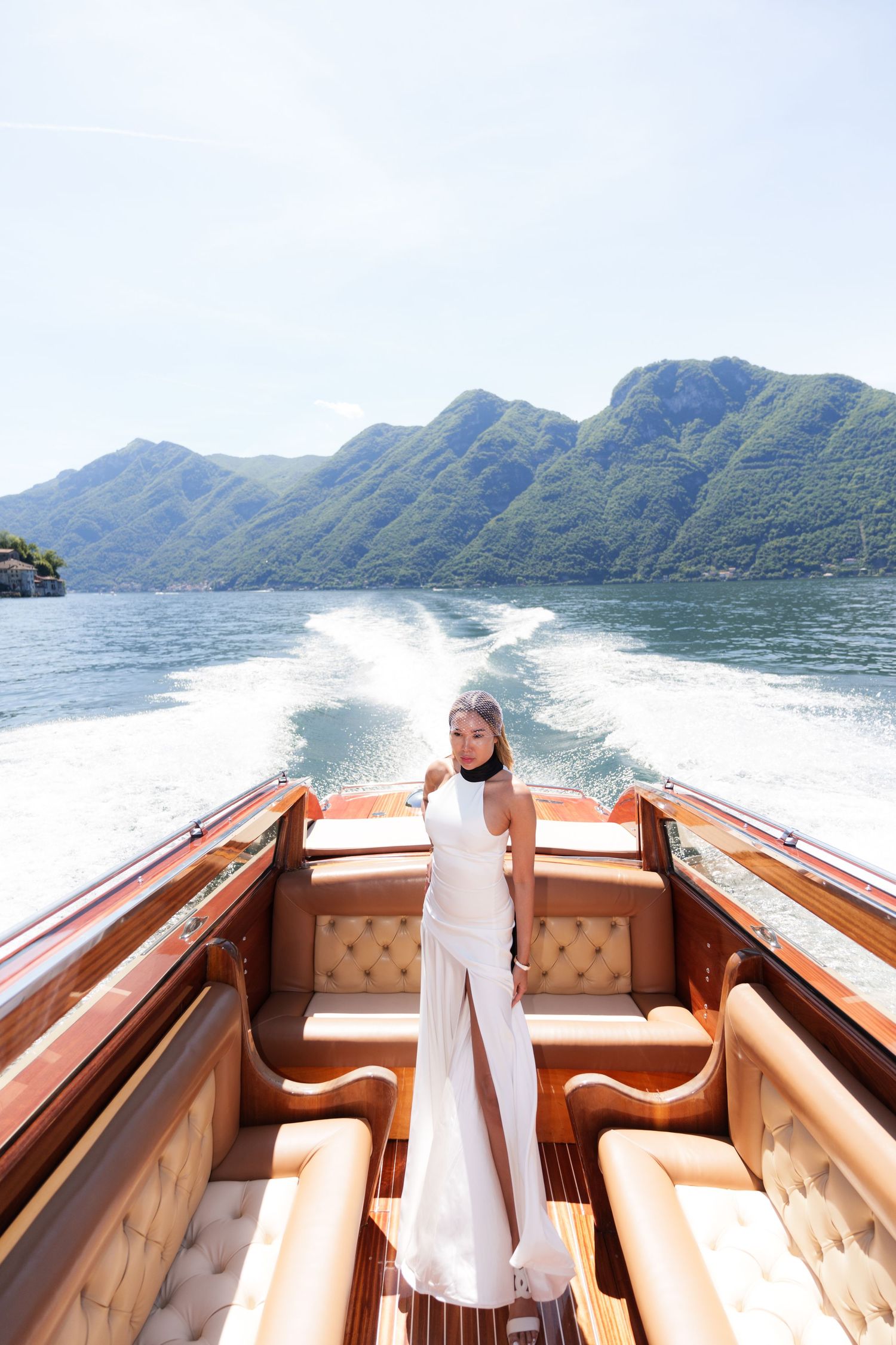 Photographer Italy Como Lake capturing cinematic luxury boat photography in Bellagio