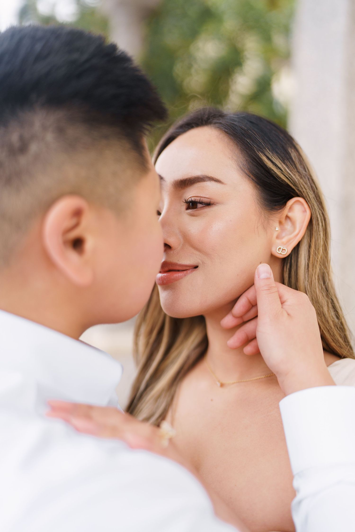 Lake Como proposal photographer capturing surprise engagement at Villa Monastero in Varenna