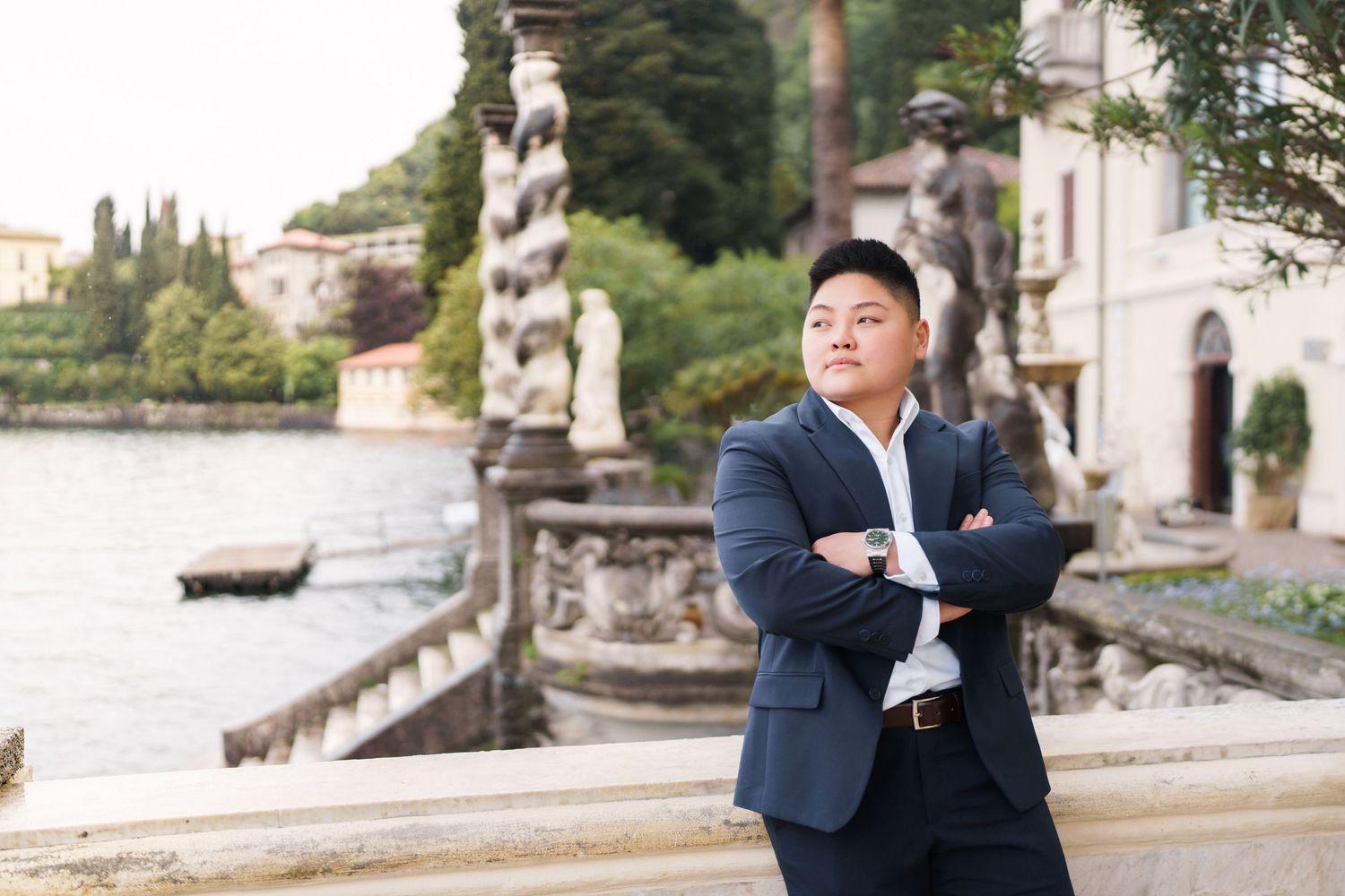 Lake Como proposal photographer capturing surprise engagement at Villa Monastero in Varenna