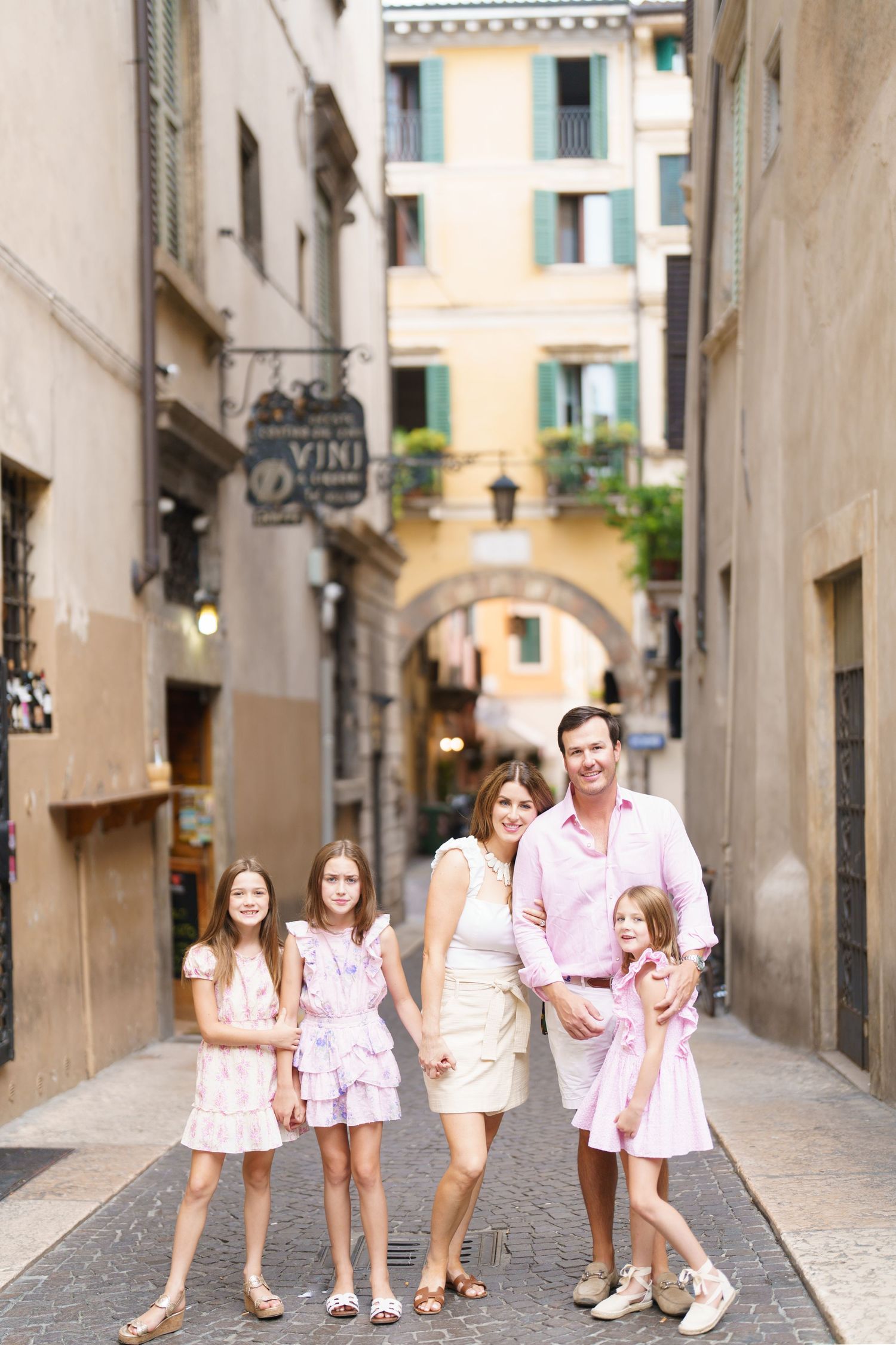 Romantic couple portrait in historic streets of Verona Italy by Verona family photographer