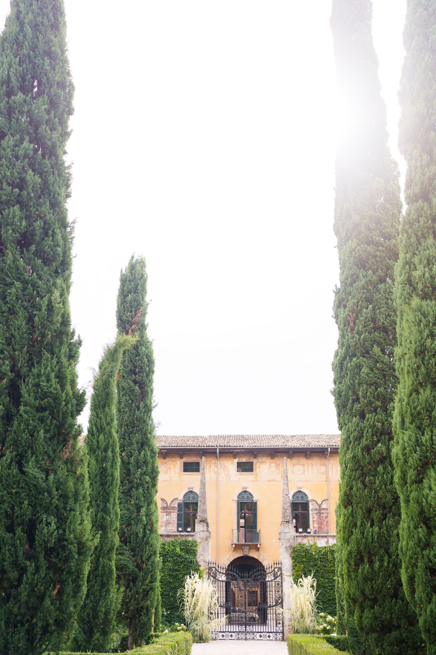 Proposal engagement photographer Verona capturing emotional couple portraits in historic Italian gardens