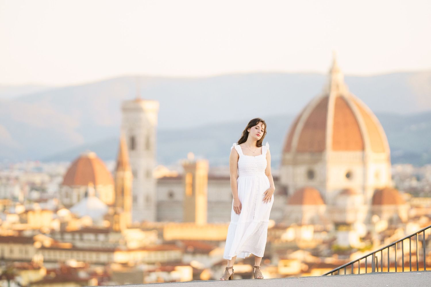 photographer Florence Italy skyline with iconic Duomo cathedral dome and historic architecture at sunset.