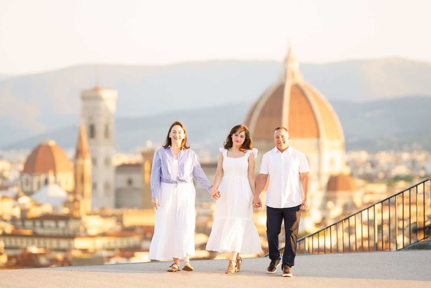 photographer Florence Italy skyline with iconic Duomo cathedral dome and historic architecture at sunset.
