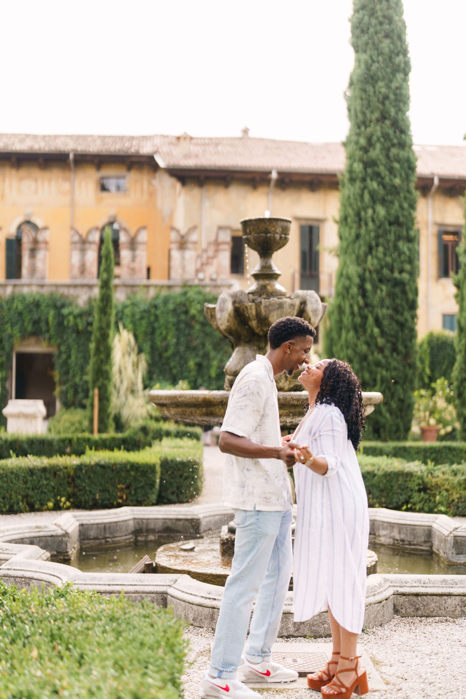 Proposal engagement and wedding photographer Italy Verona capturing natural emotional moments