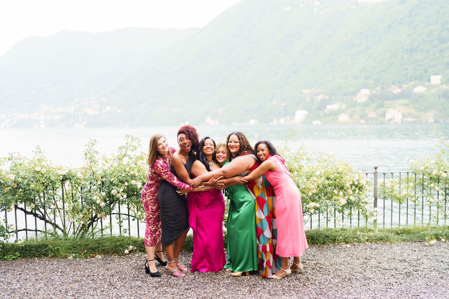 Elegant women group portrait overlooking Lake Como celebration