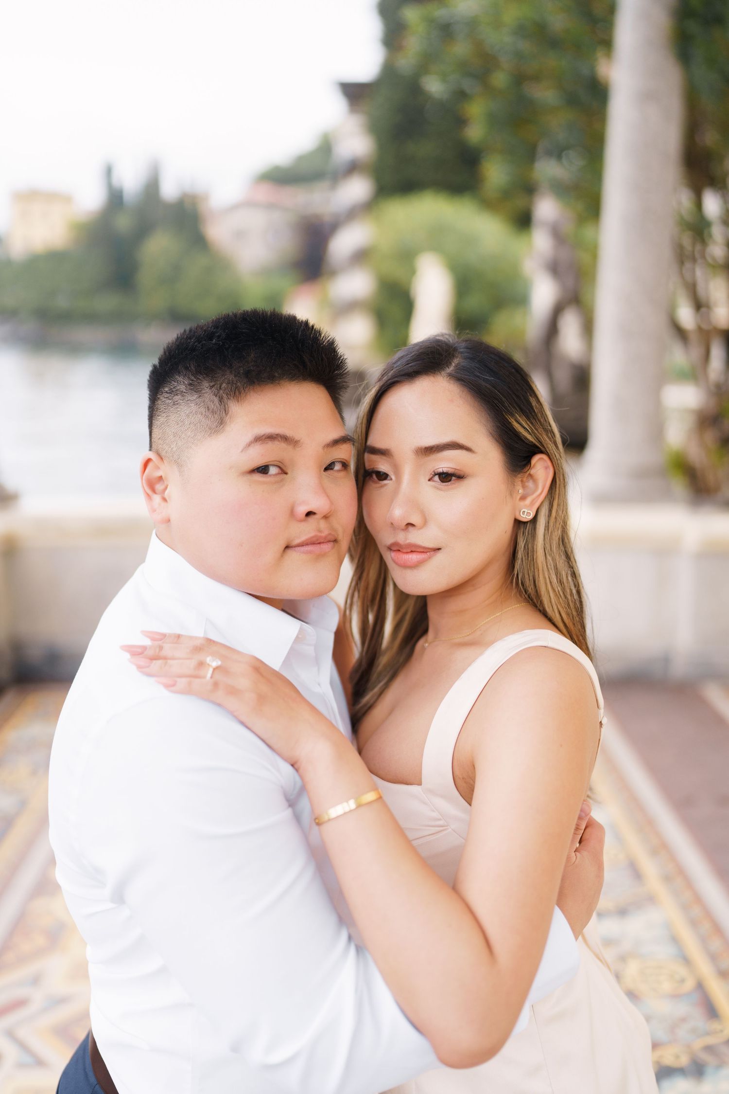 Lake Como proposal photographer capturing surprise engagement at Villa Monastero in Varenna